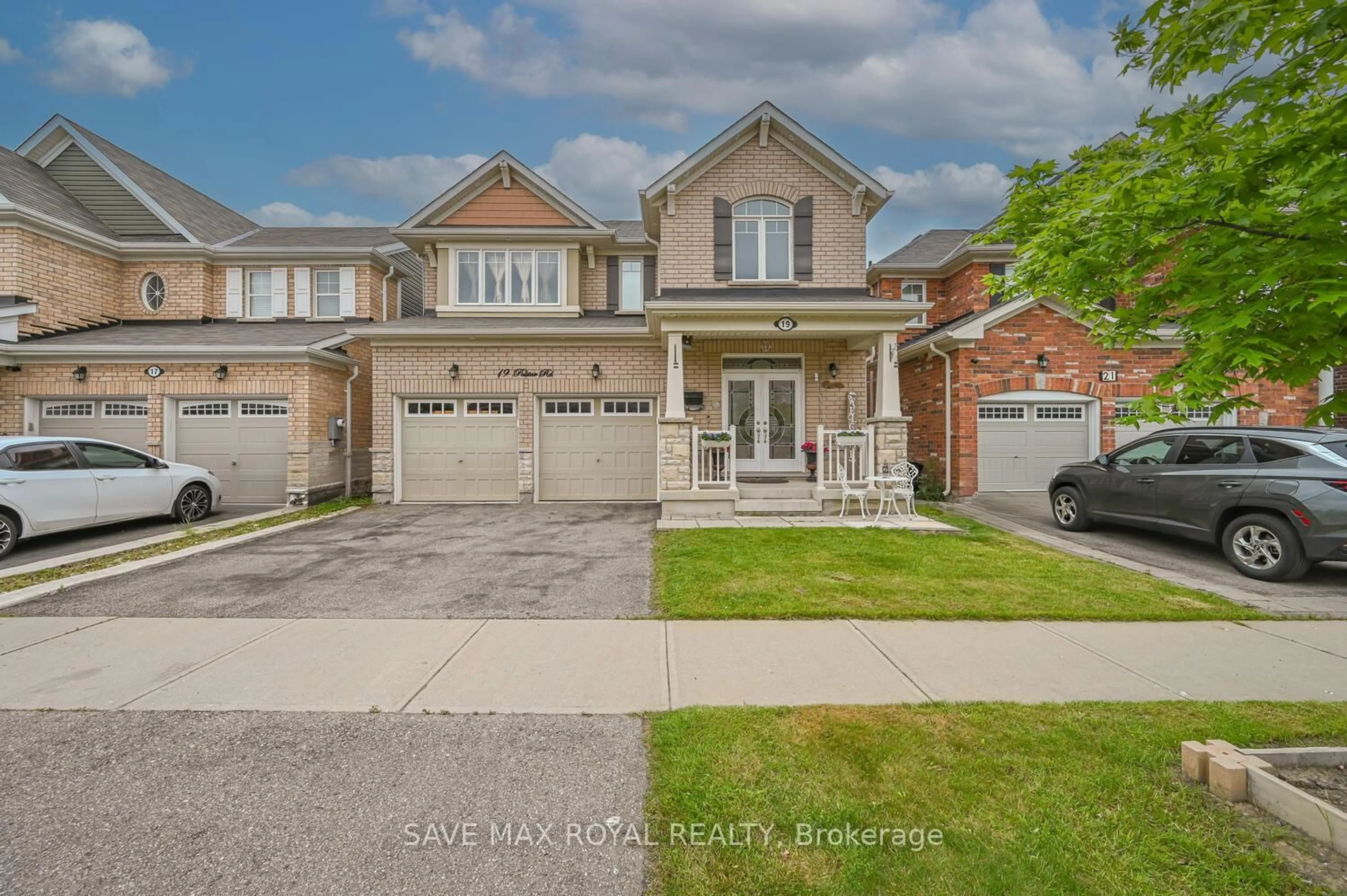 Home with brick exterior material, street for 19 POLSTAR Rd, Brampton Ontario L7A 4H1