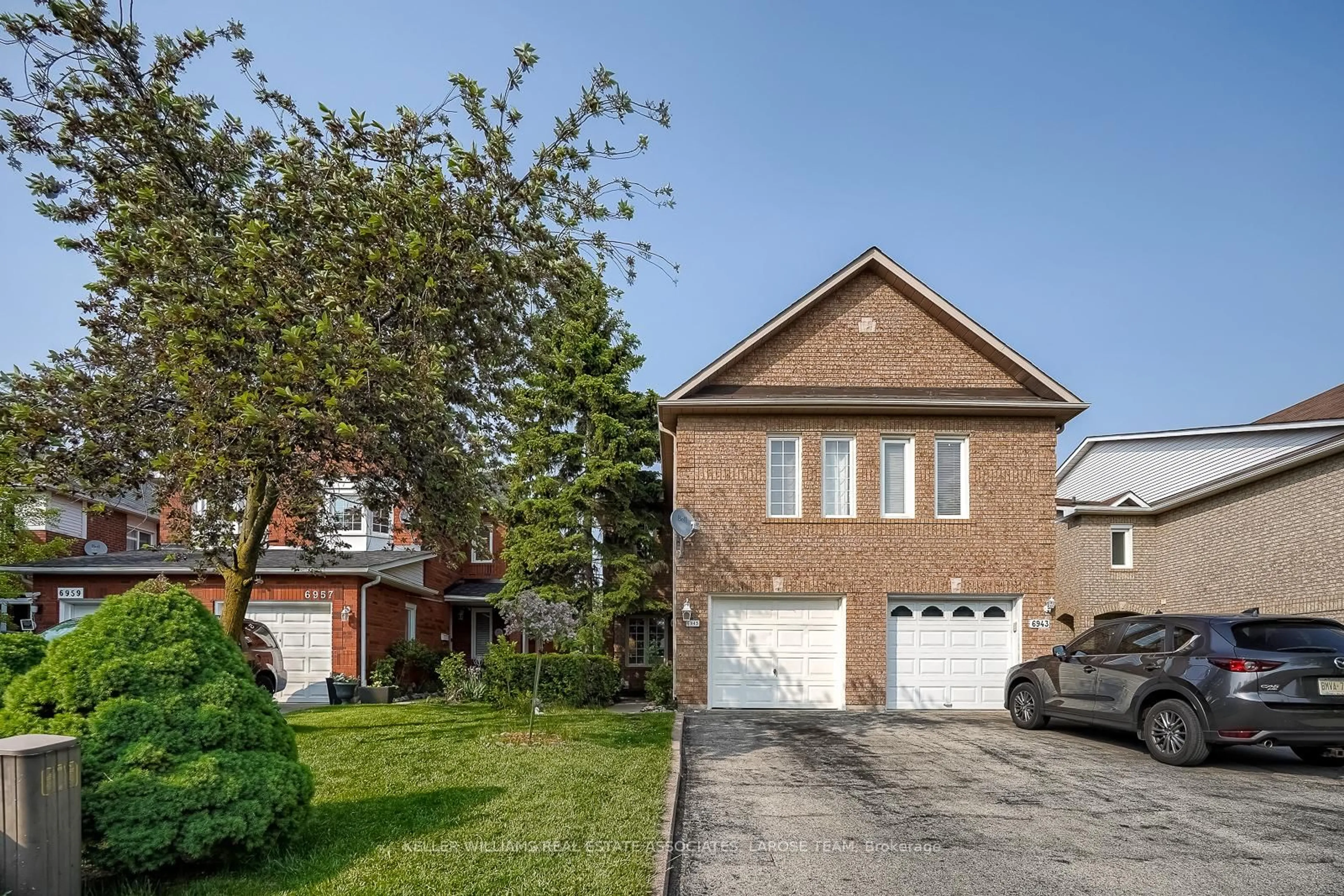 Home with brick exterior material, street for 6945 Gracefield Dr, Mississauga Ontario L5N 6T9