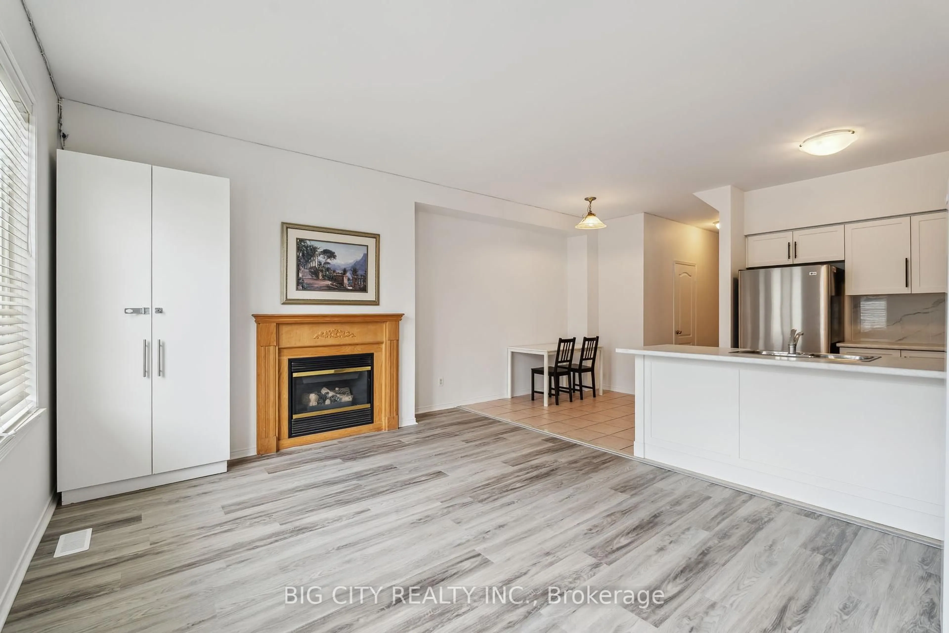 Open concept kitchen, wood/laminate floor for 31 Haynes Ave, Toronto Ontario M3J 3P8