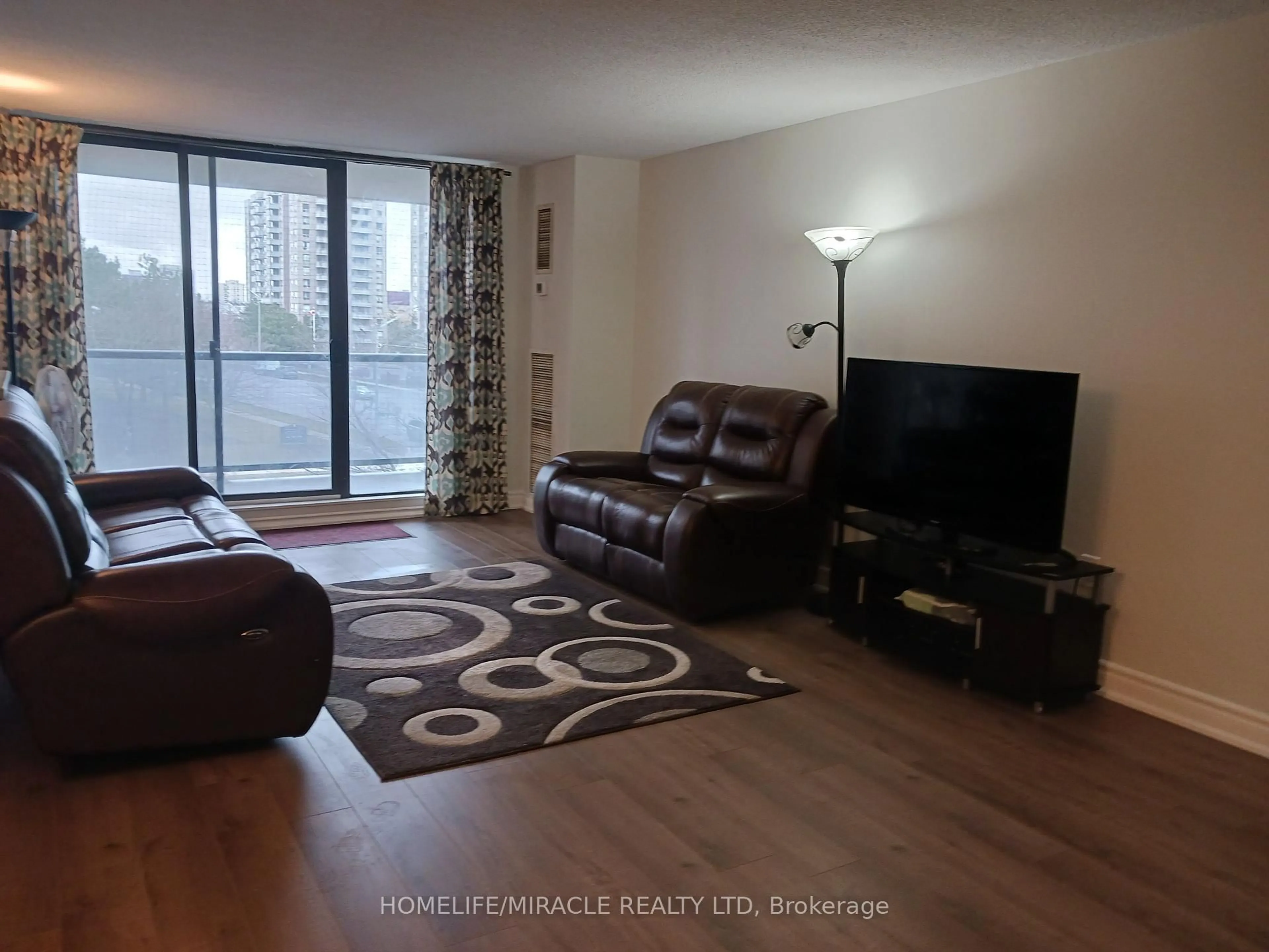 Living room with furniture, unknown for 17 KnightsBridge Rd #410, Brampton Ontario L6T 3X9