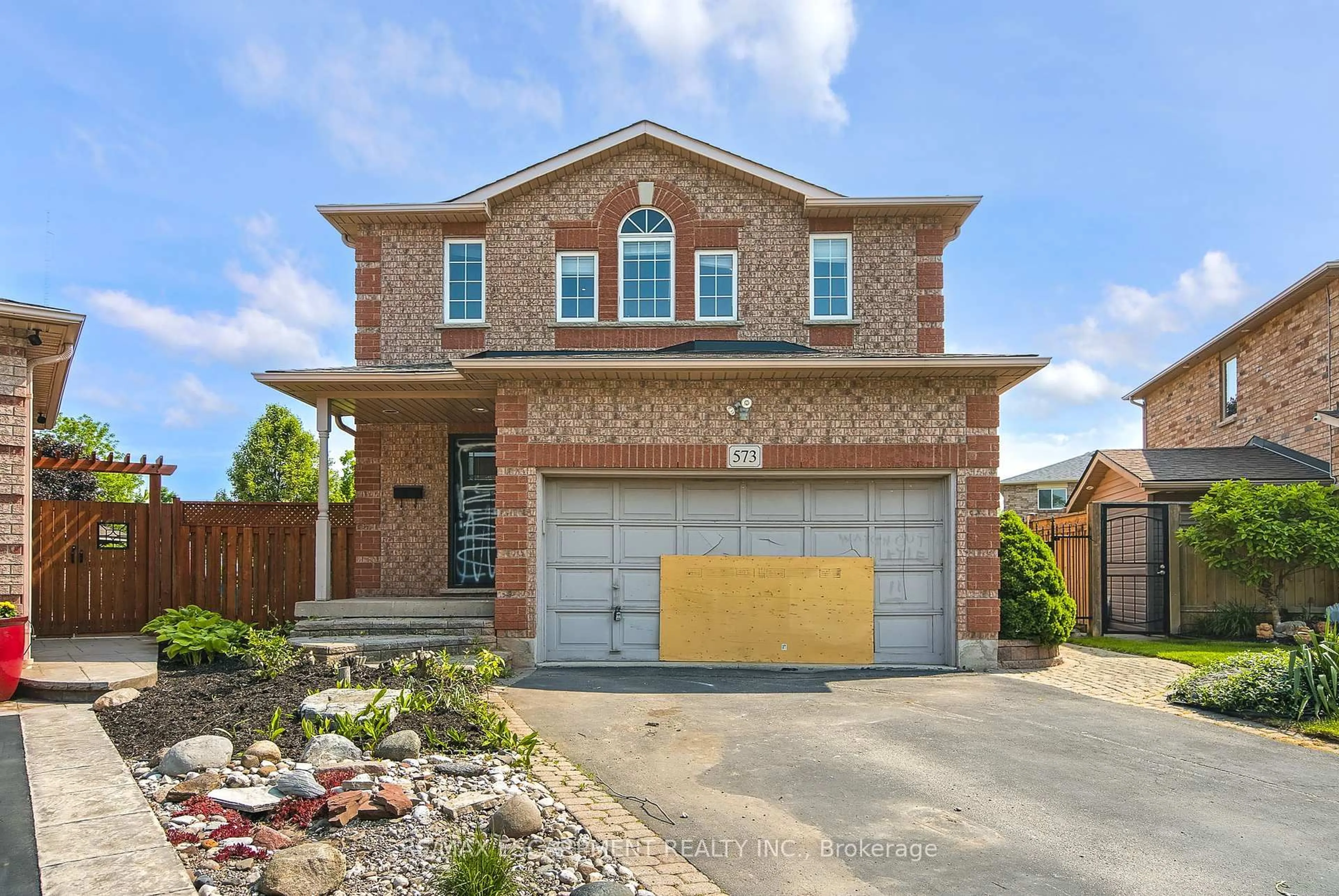 Home with brick exterior material, street for 573 Enfield Rd, Burlington Ontario L7T 2X5