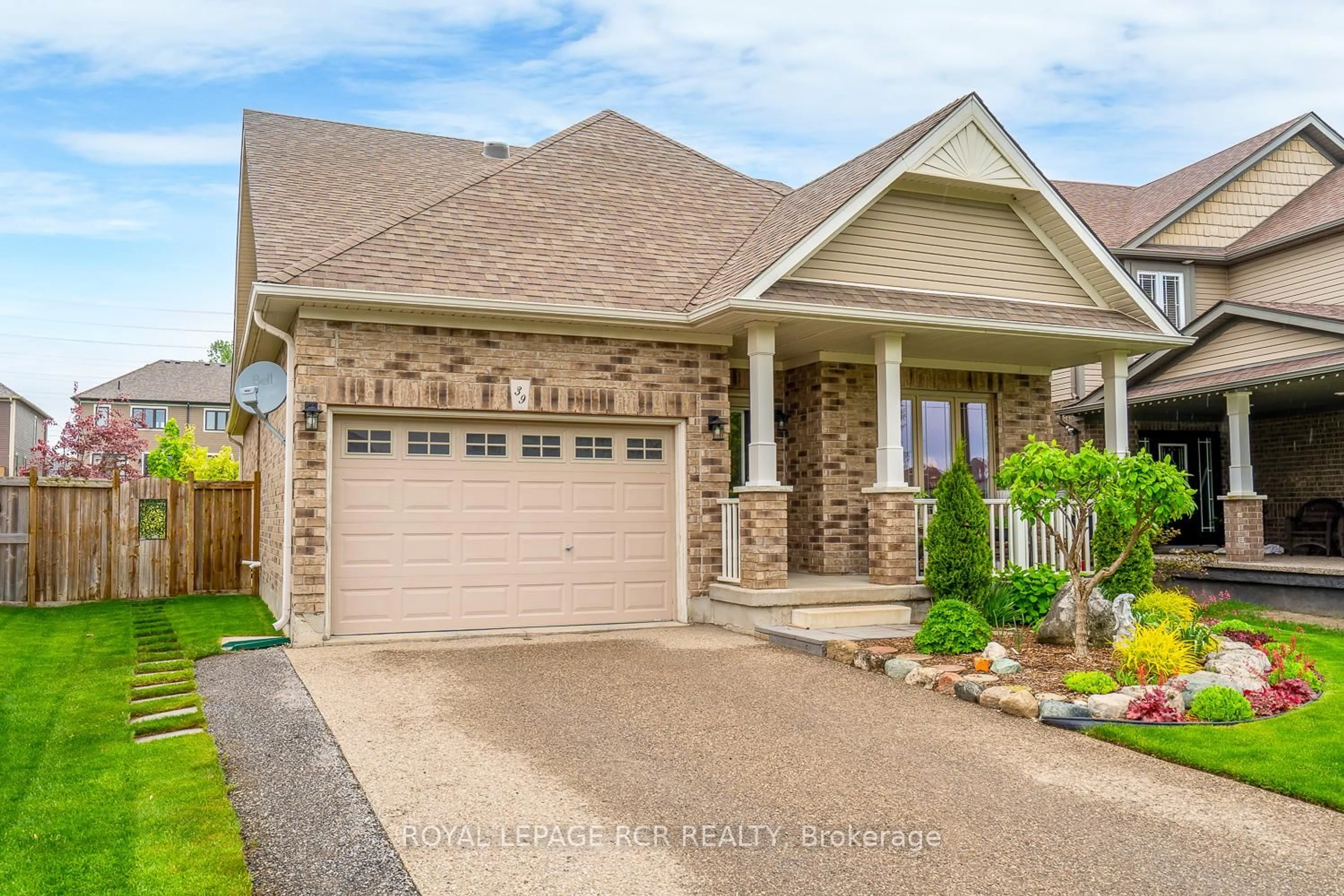 Home with brick exterior material, street for 39 Dinnick Cres, Orangeville Ontario L9W 0B7