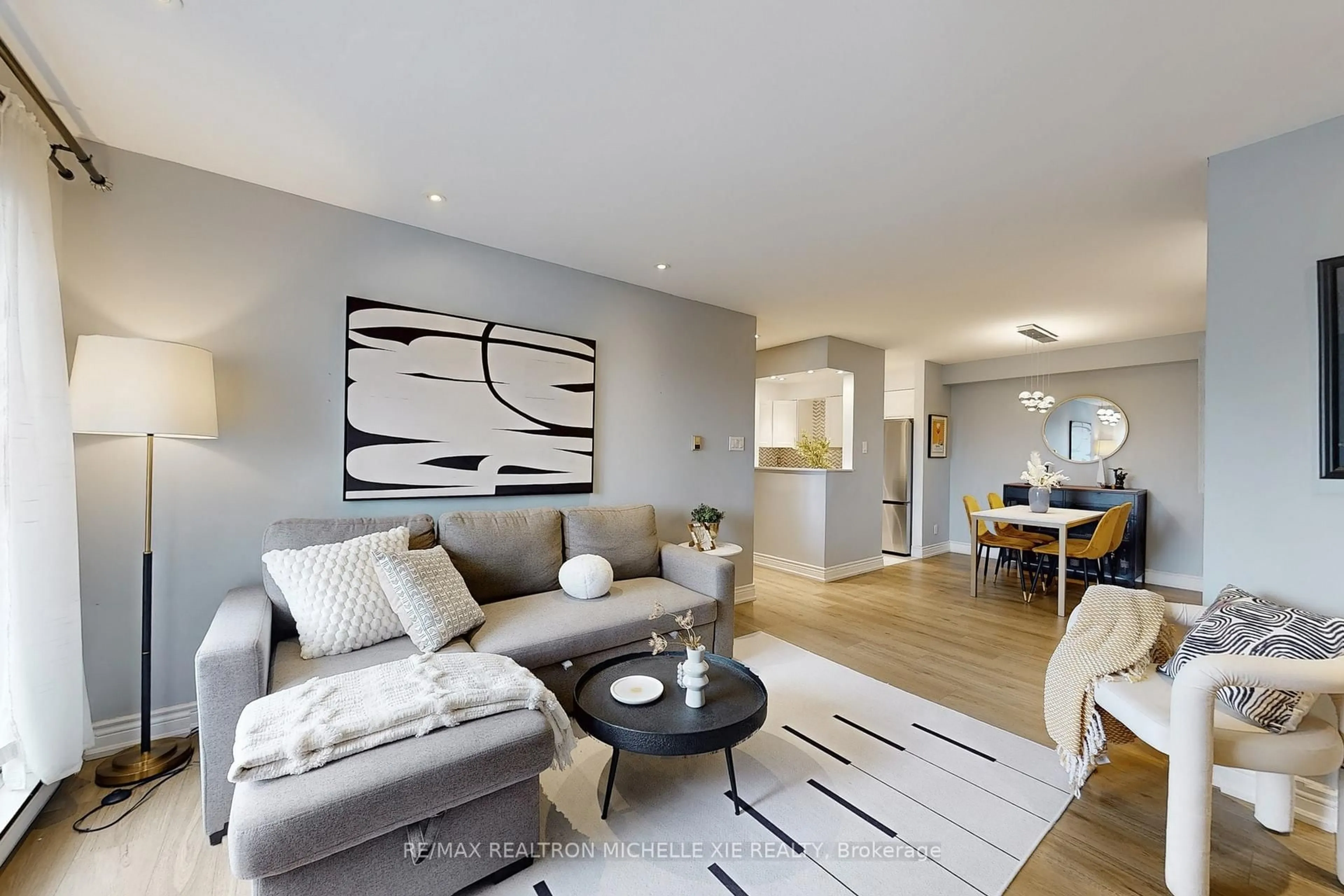 Living room with furniture, unknown for 65 Trailwood Dr #133, Mississauga Ontario L4Z 3L1