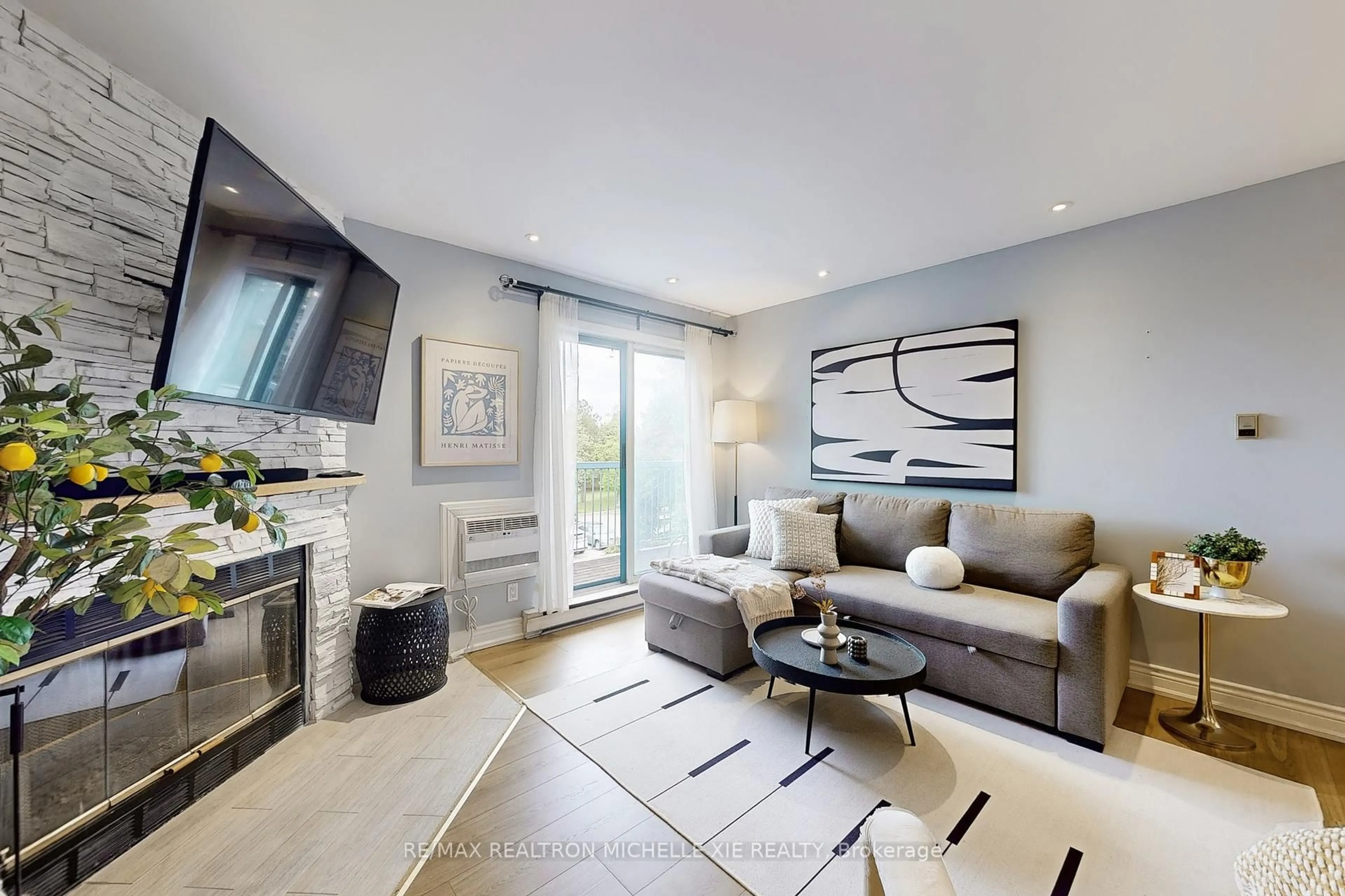 Living room with furniture, unknown for 65 Trailwood Dr #133, Mississauga Ontario L4Z 3L1
