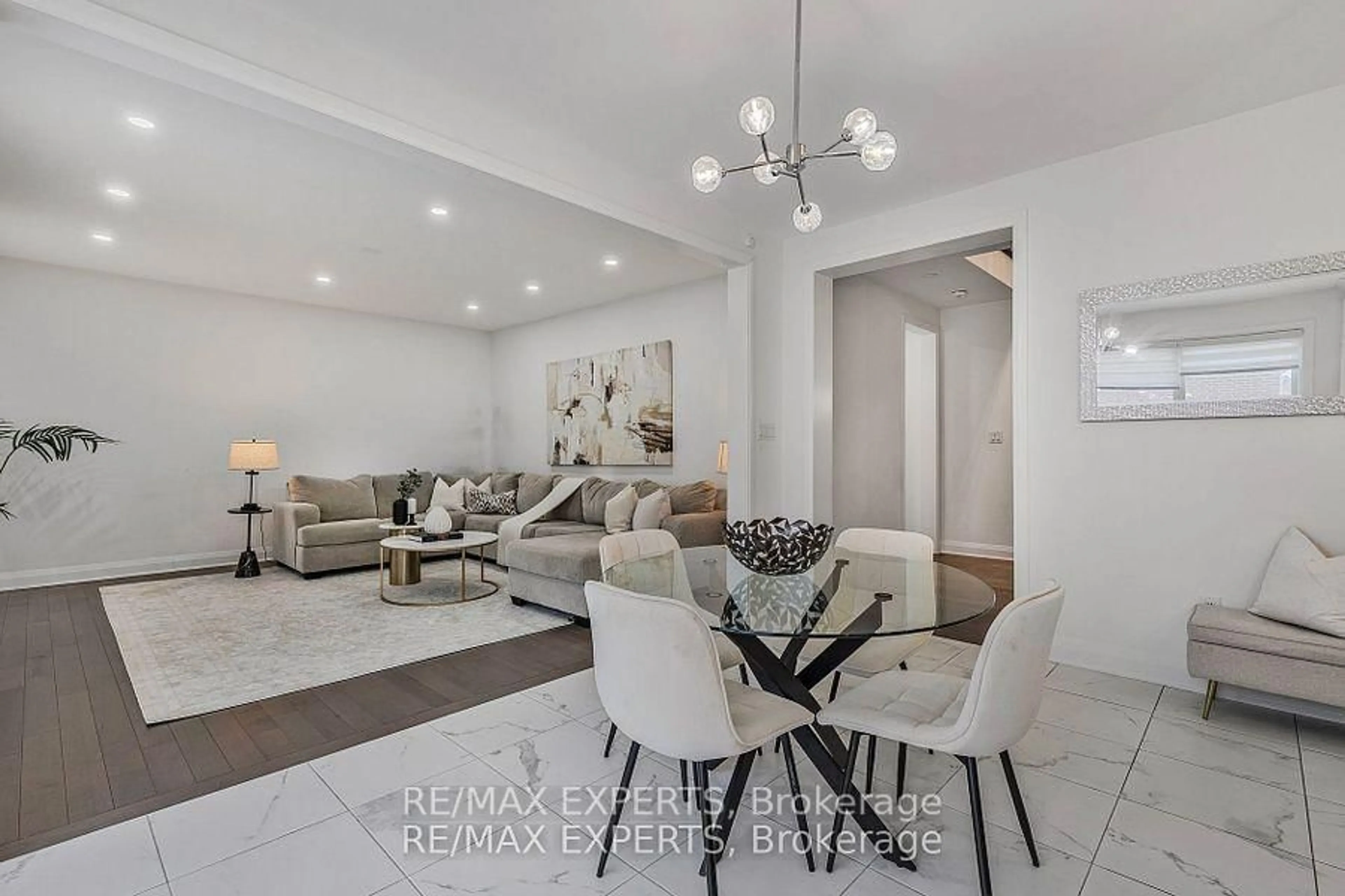 Living room with furniture, ceramic/tile floor for 1411 Lobelia Cres, Milton Ontario L9E 1X1