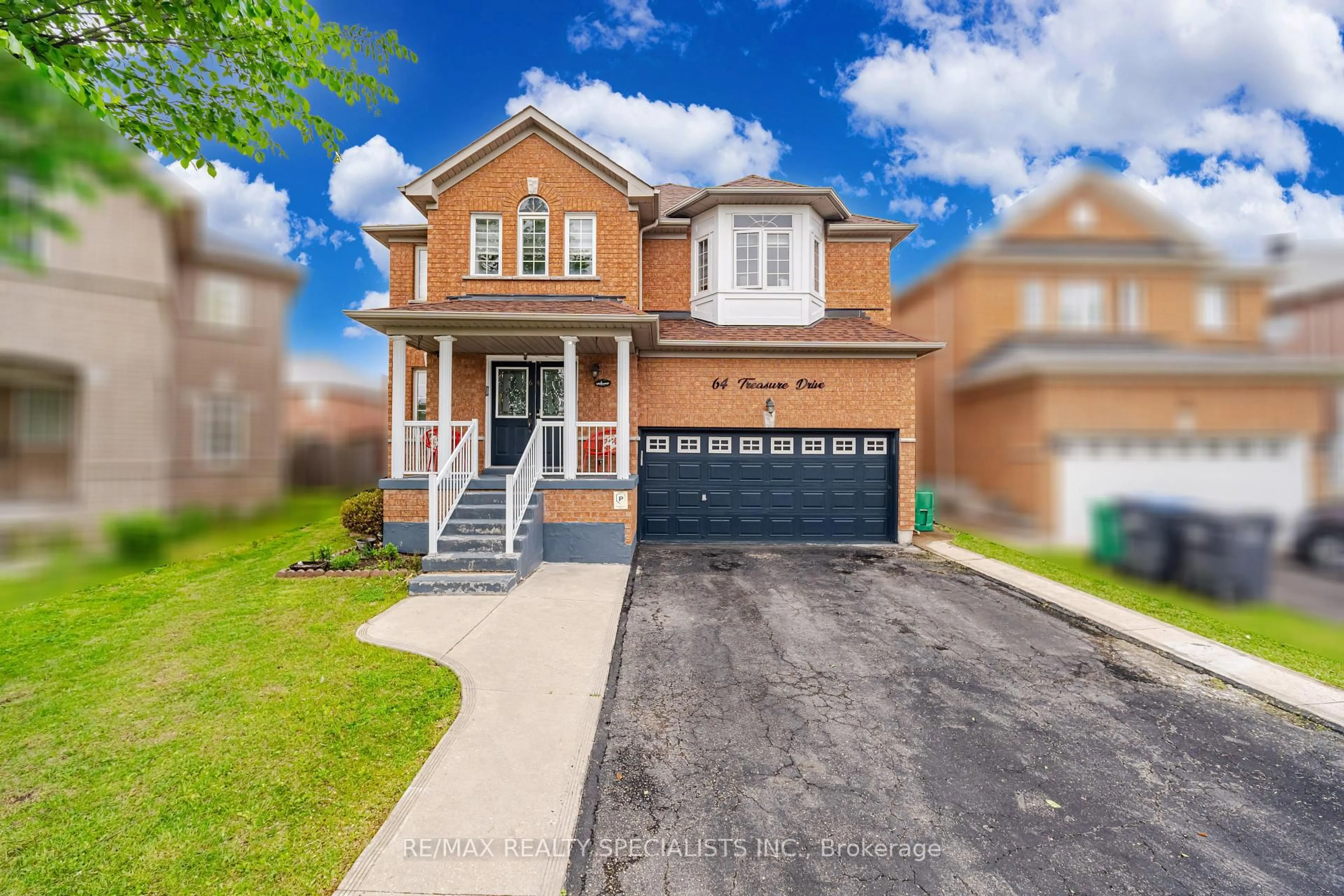Home with brick exterior material, street for 64 Treasure Dr, Brampton Ontario L7A 3L7