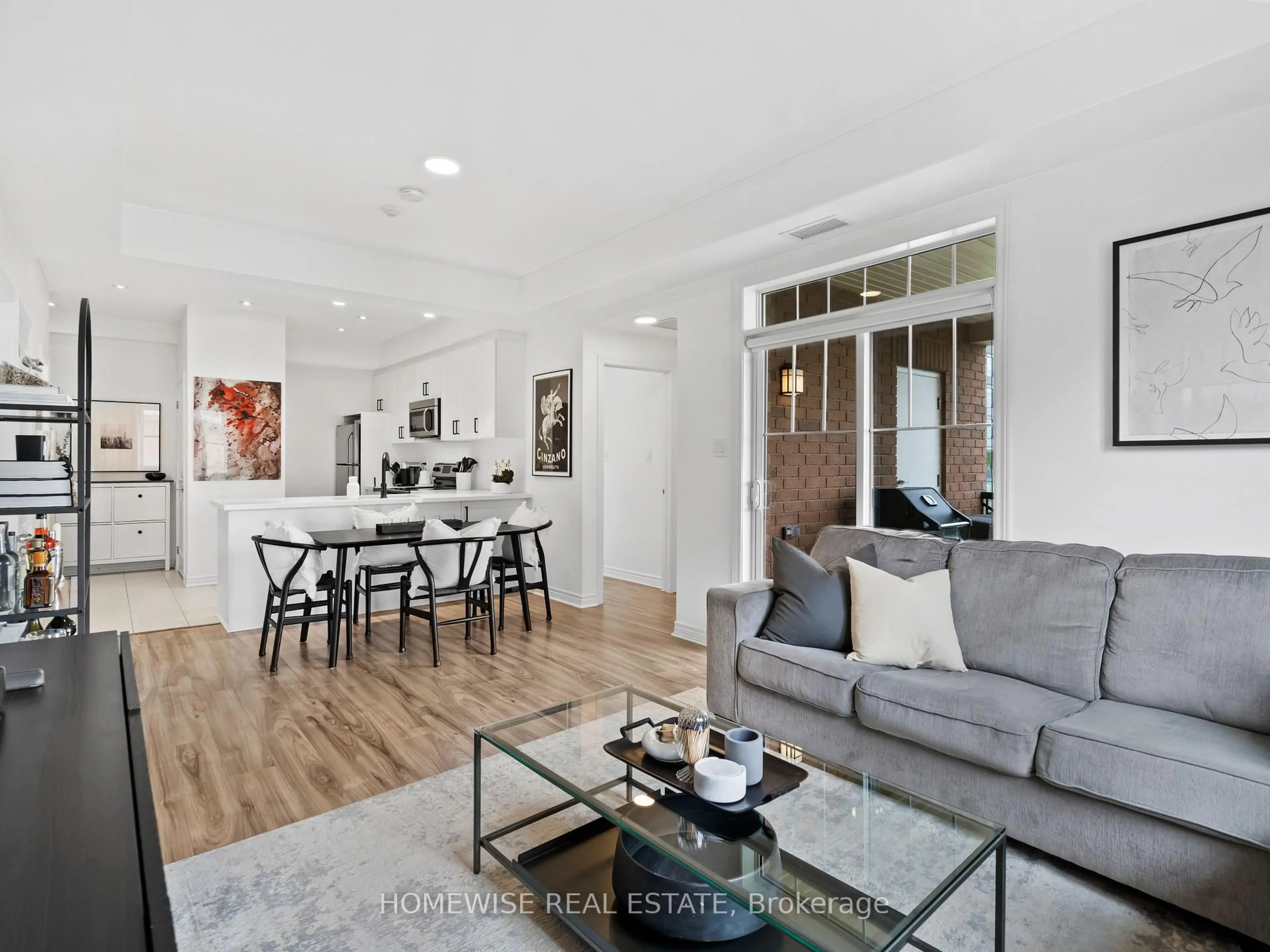 Living room with furniture, unknown for 2338 Taunton Rd #304, Oakville Ontario L6H 0L3