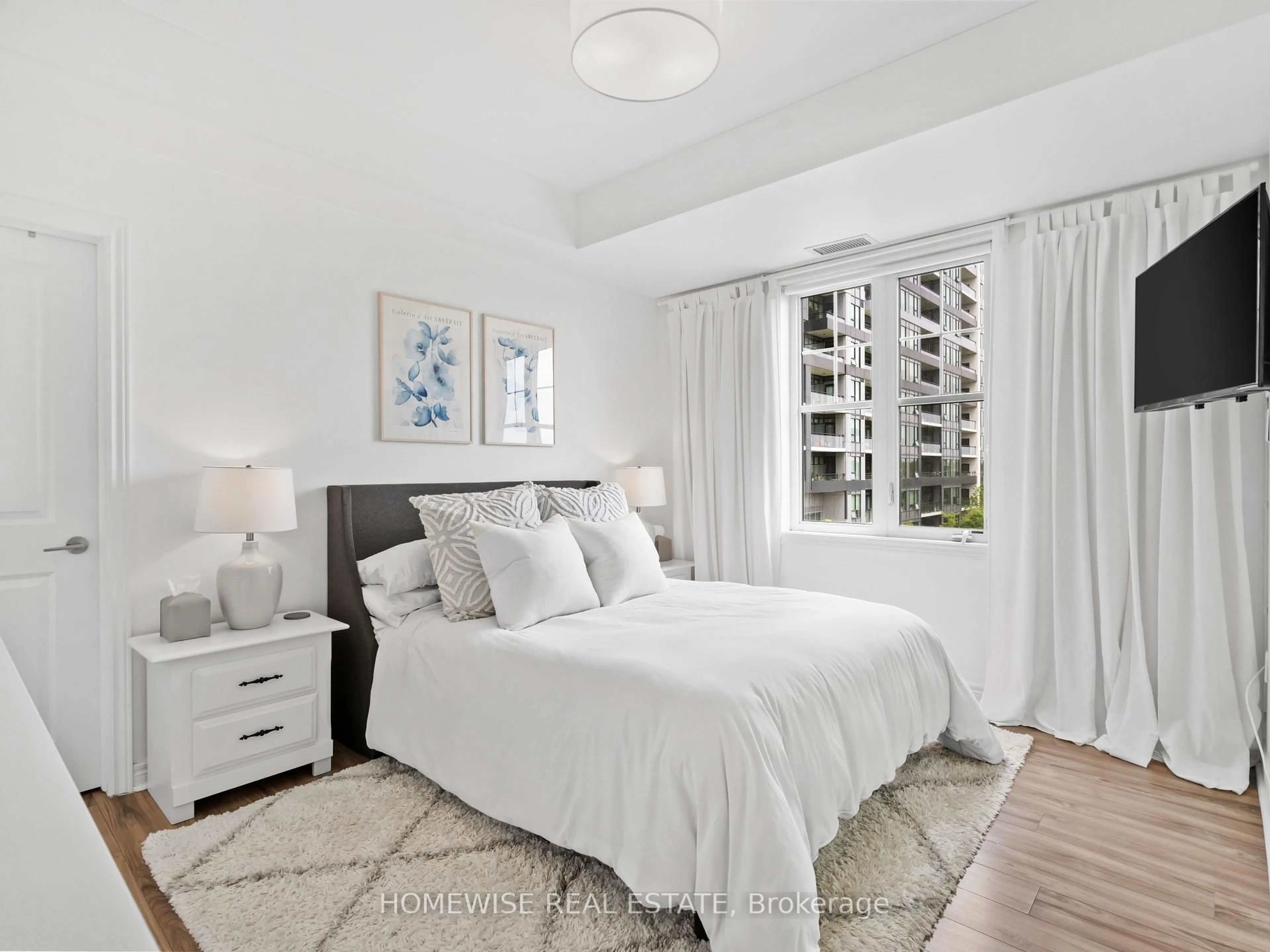 Bedroom with bed, unknown for 2338 Taunton Rd #304, Oakville Ontario L6H 0L3
