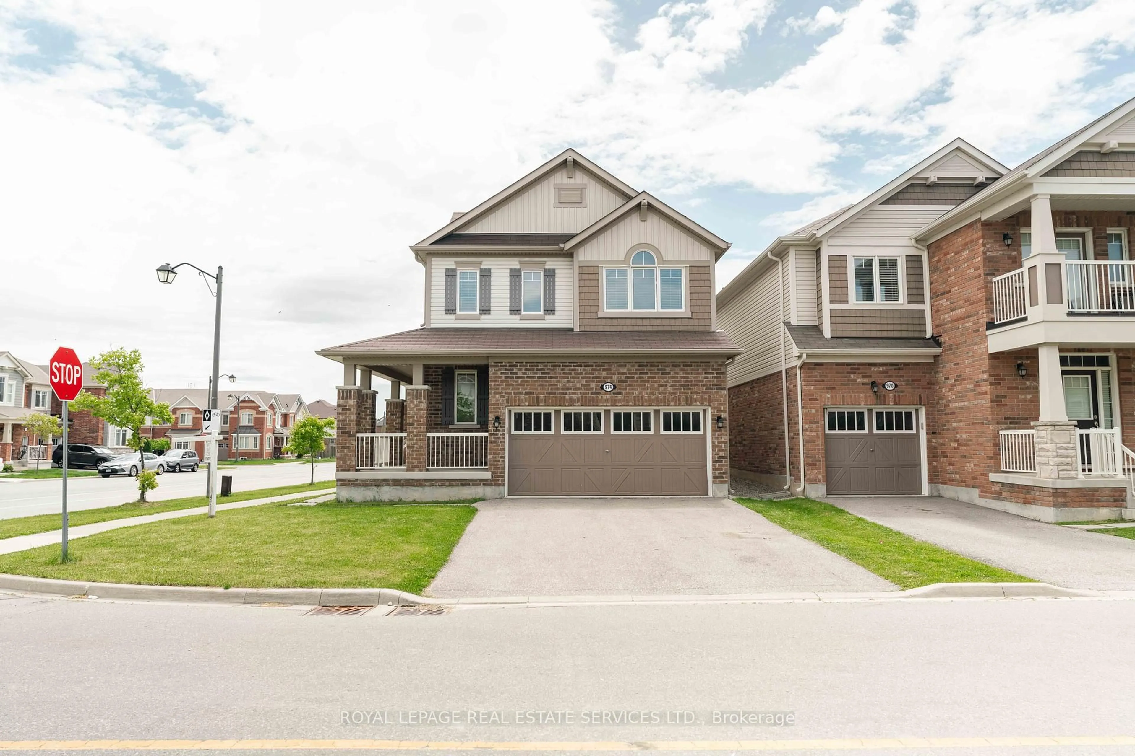 Home with brick exterior material, street for 974 Penson Cres, Milton Ontario L9T 8Z7