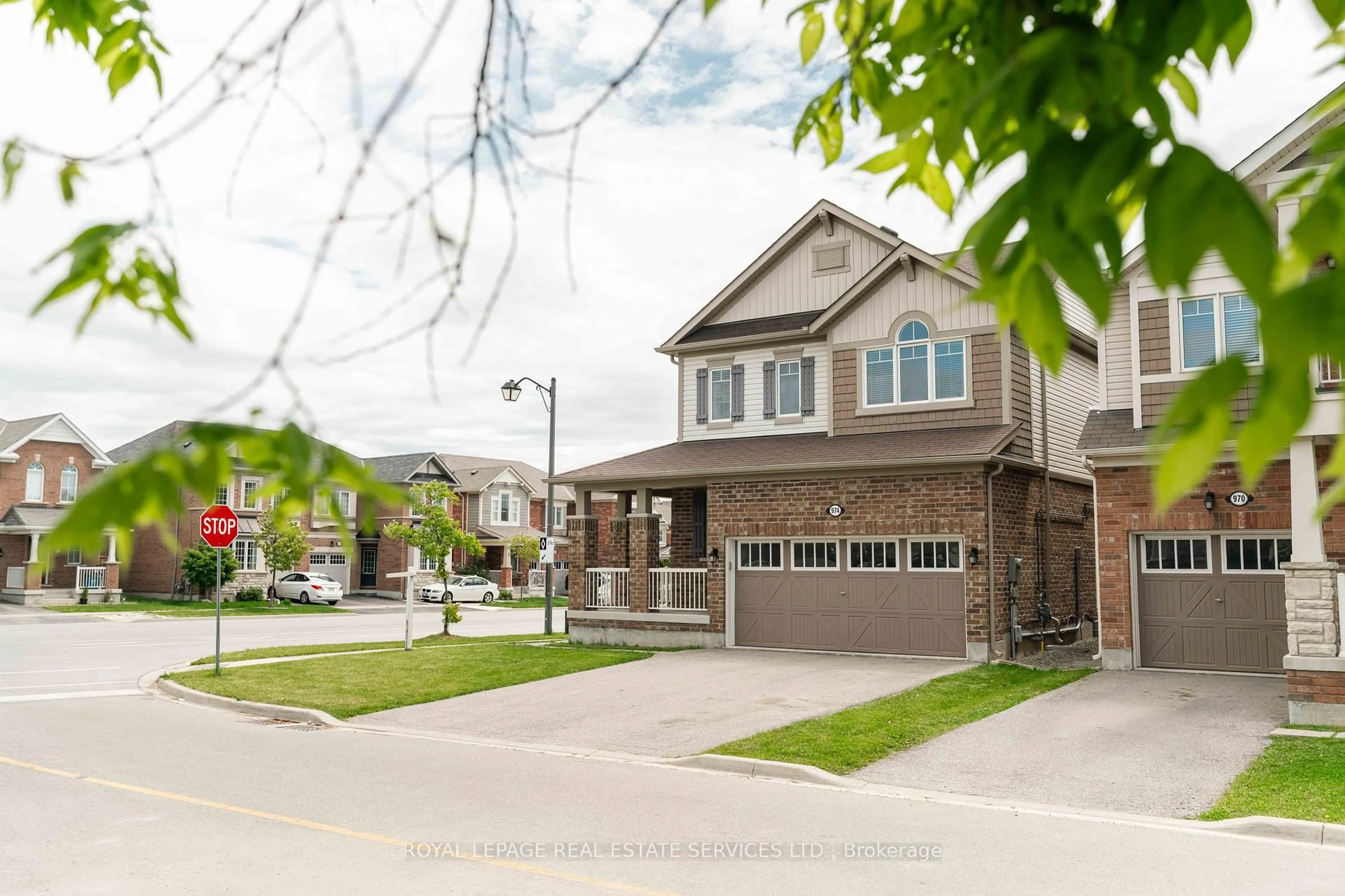 Home with brick exterior material, street for 974 Penson Cres, Milton Ontario L9T 8Z7