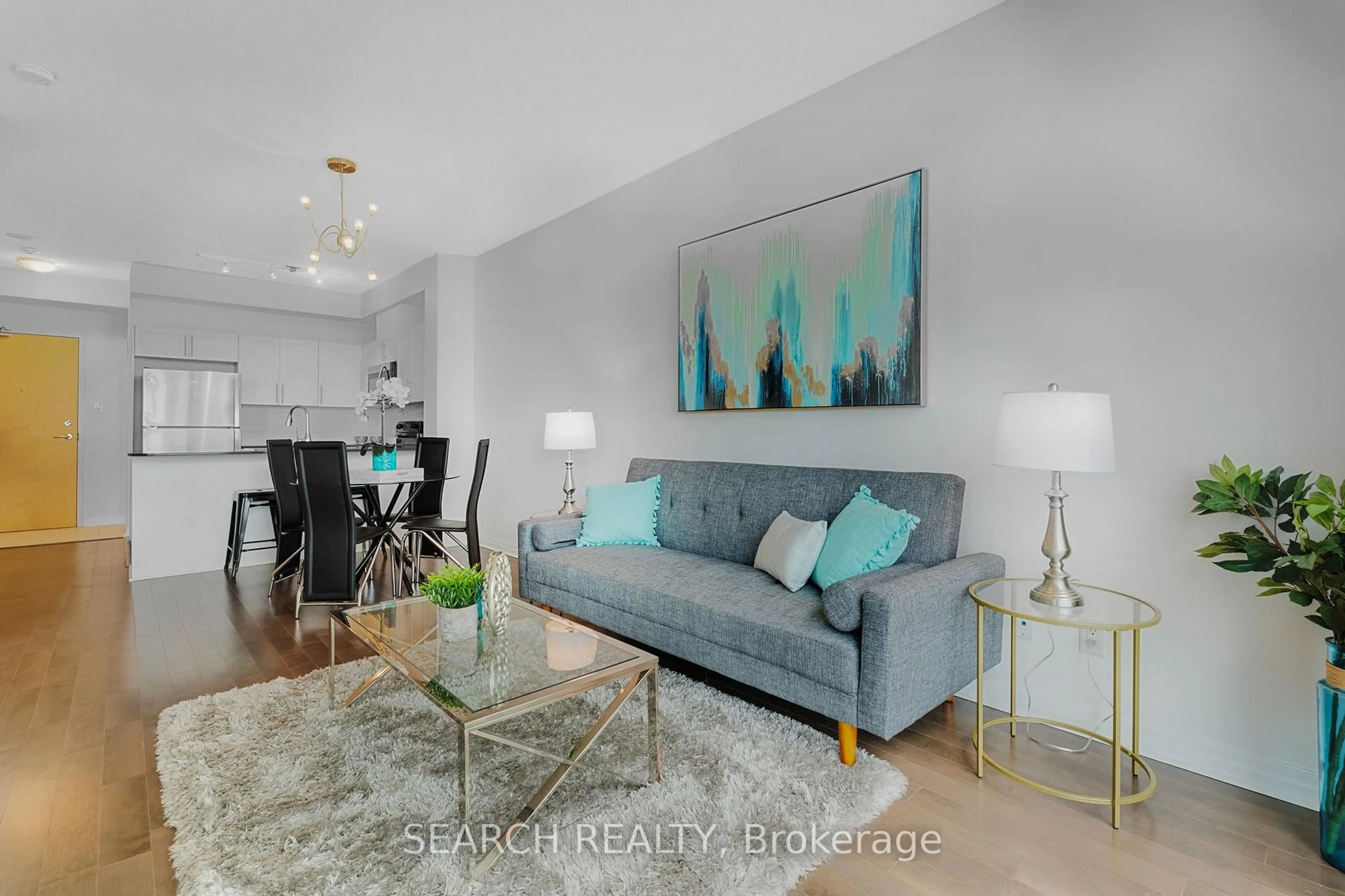 Living room with furniture, unknown for 3515 Kariya Dr #703, Mississauga Ontario L5B 0C1