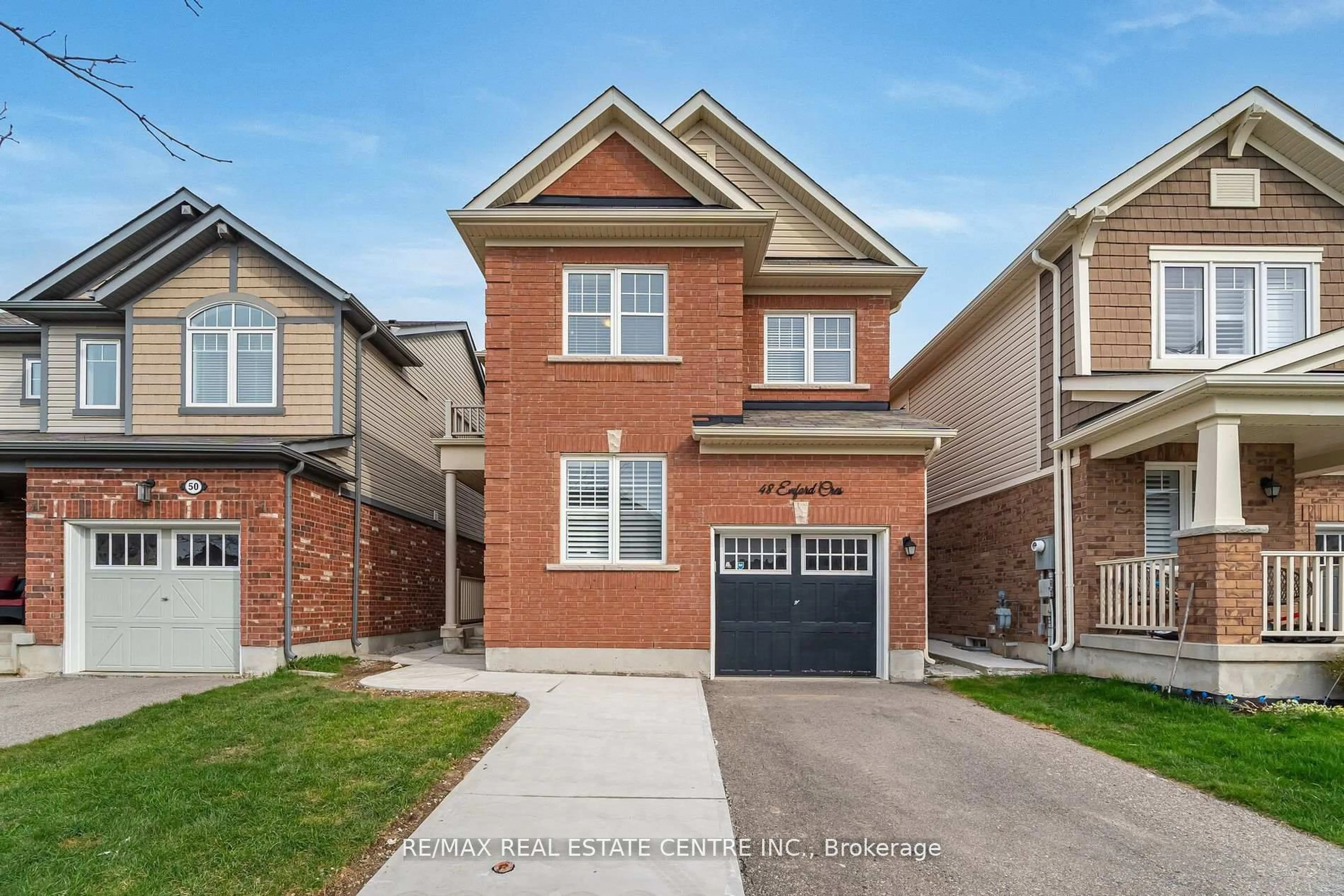 Home with brick exterior material, street for 48 Enford Cres, Brampton Ontario L7A 4C7