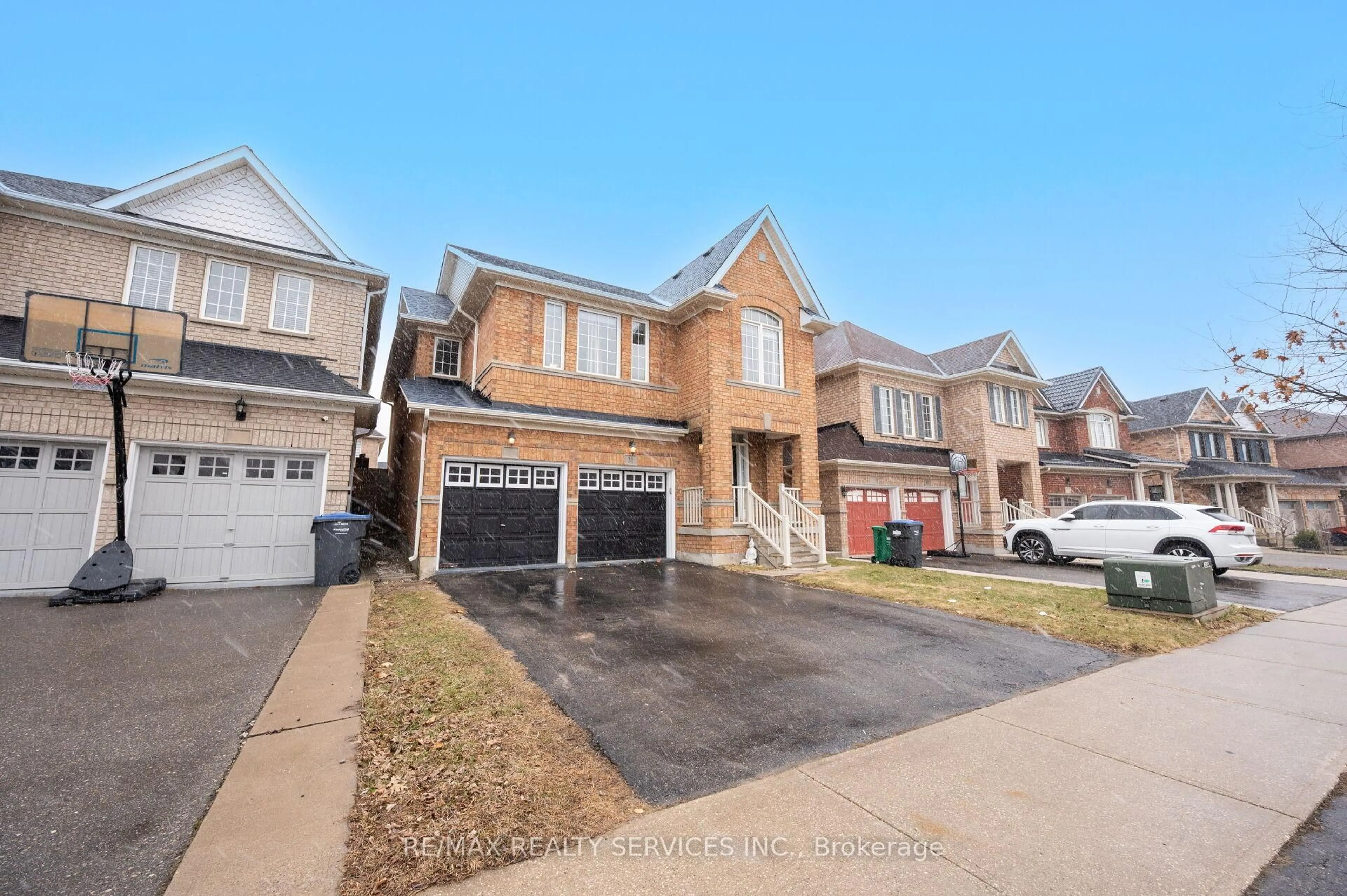 Home with brick exterior material, street for 31 Rambling Oak Dr, Brampton Ontario L7A 3X8