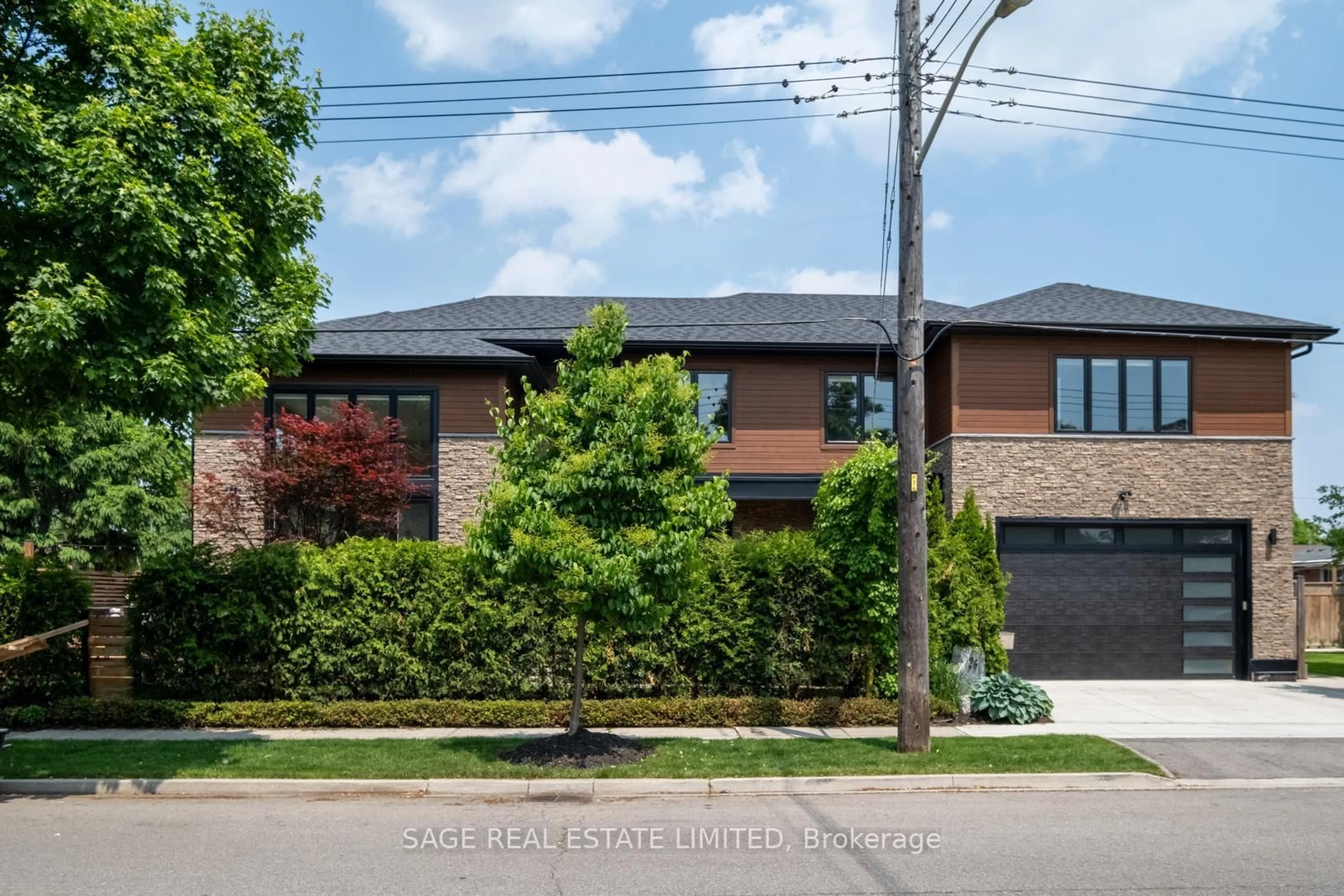 Home with brick exterior material, street for 26 Wellesworth Dr, Toronto Ontario M9C 4P7