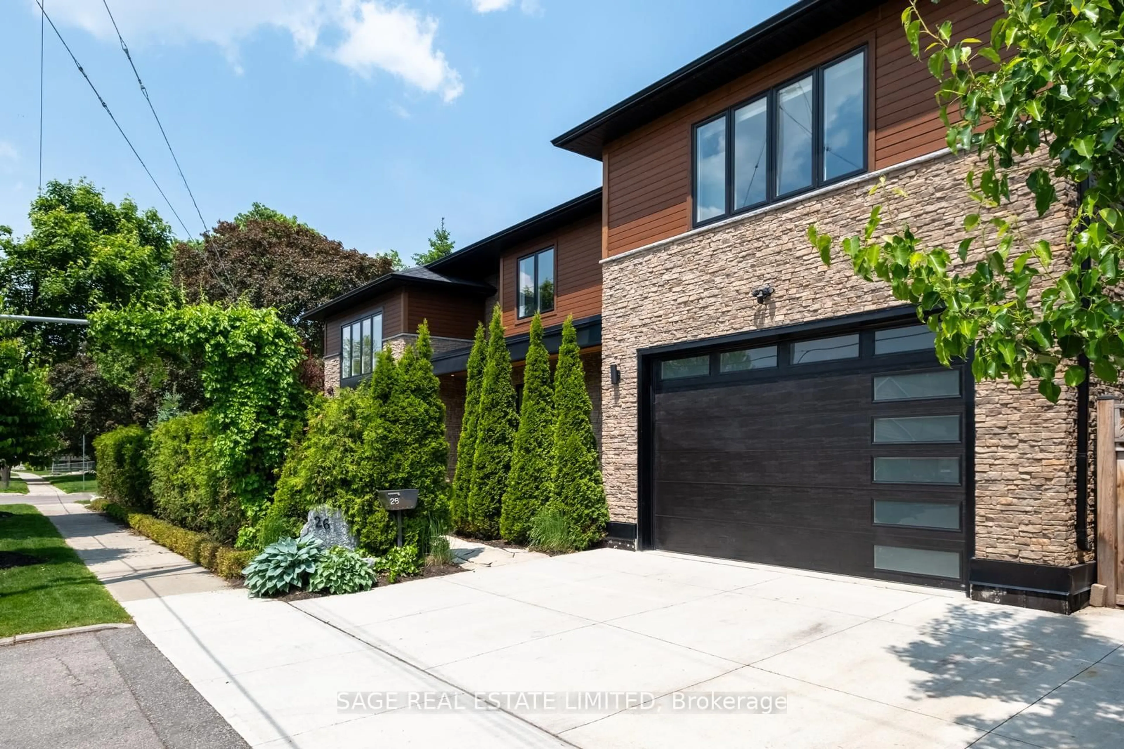 Home with brick exterior material, street for 26 Wellesworth Dr, Toronto Ontario M9C 4P7