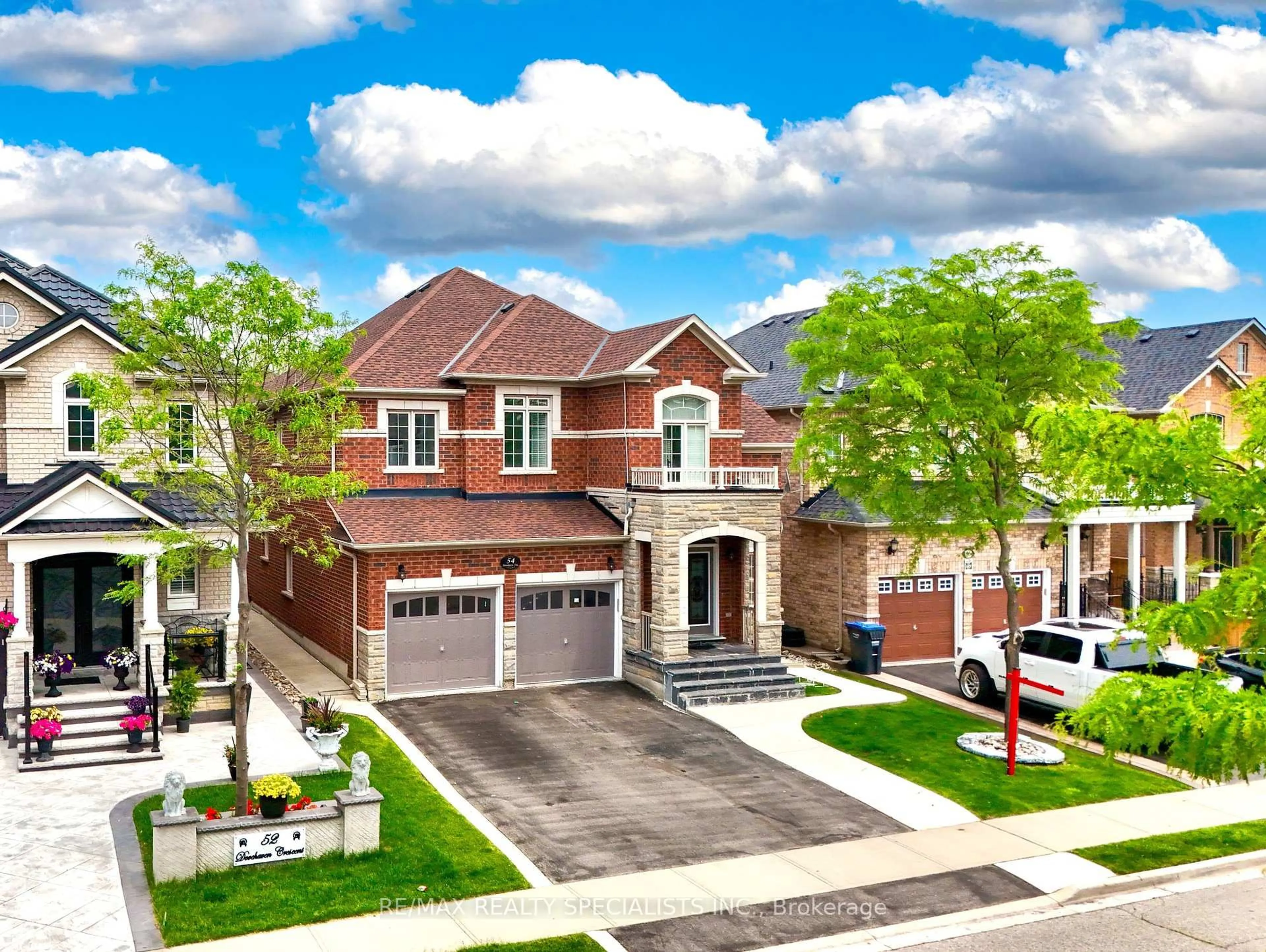 Home with brick exterior material, street for 54 Dovehaven Cres, Brampton Ontario L6P 2N8