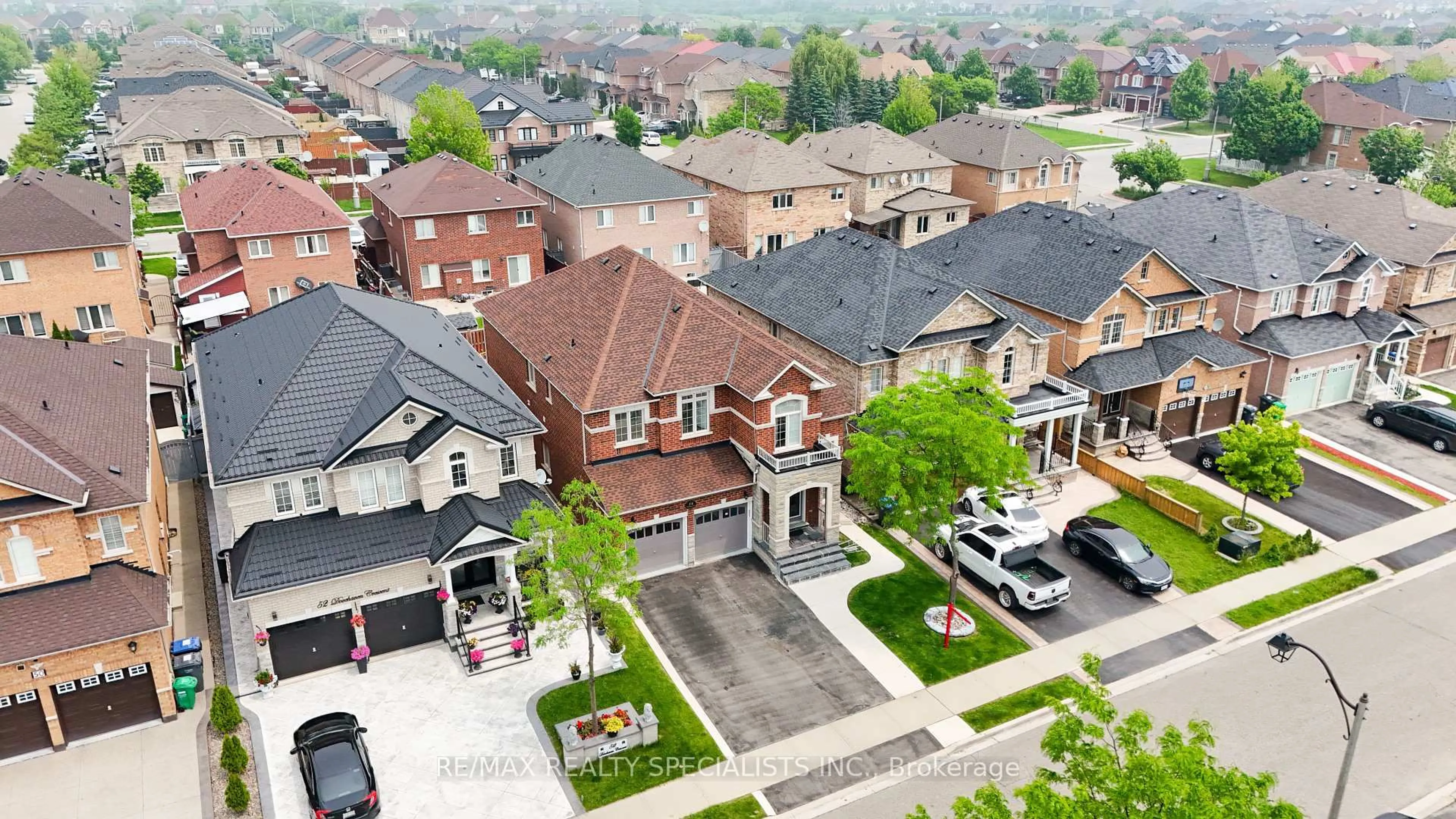 A pic from outside/outdoor area/front of a property/back of a property/a pic from drone, street for 54 Dovehaven Cres, Brampton Ontario L6P 2N8