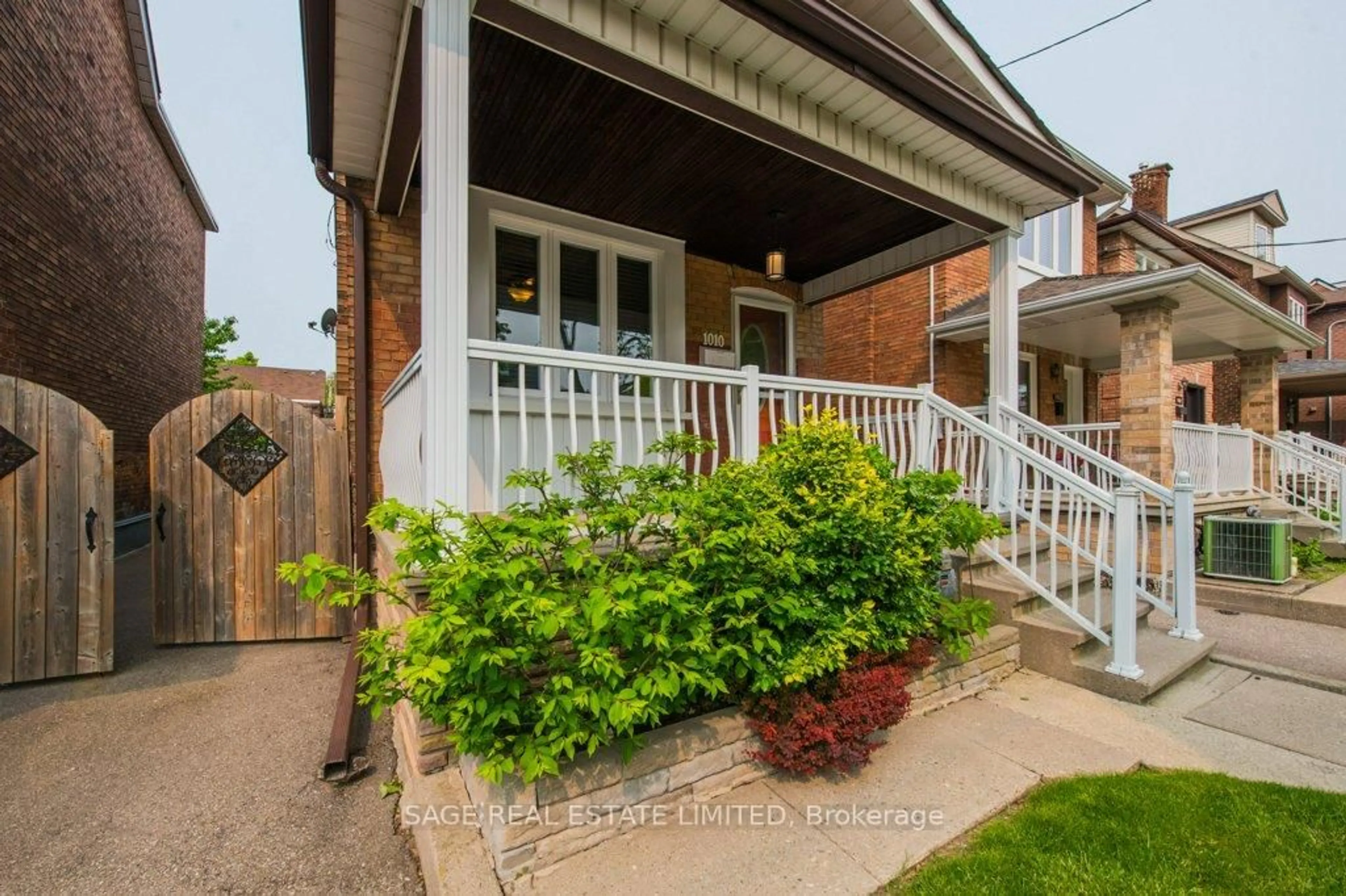 Home with brick exterior material, street for 1010 St Clarens Ave, Toronto Ontario M6H 3X7