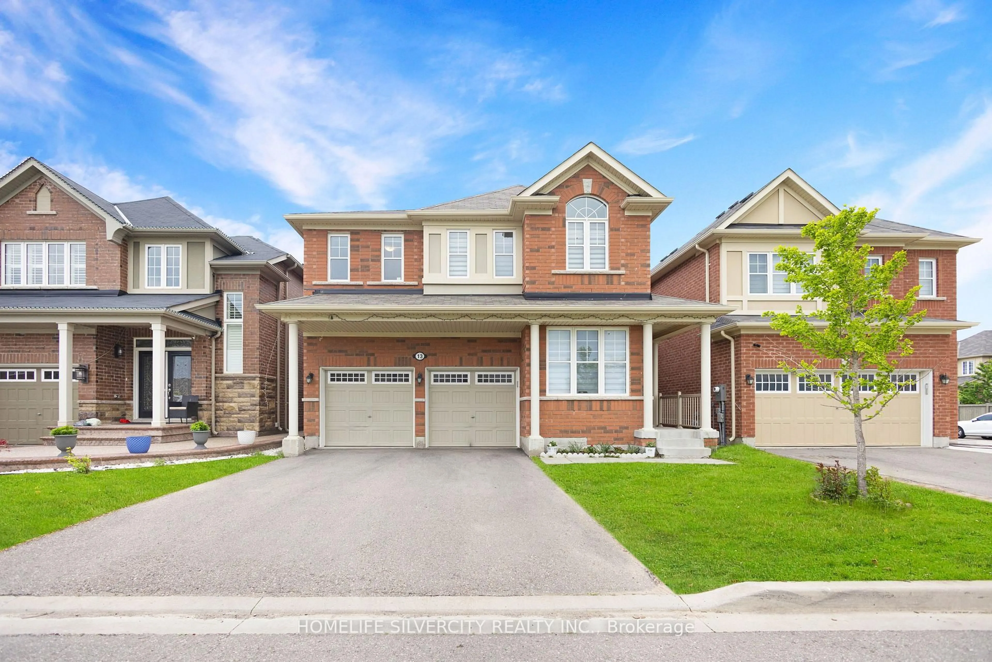 Home with brick exterior material, street for 13 Minna Tr, Brampton Ontario L7A 4T1