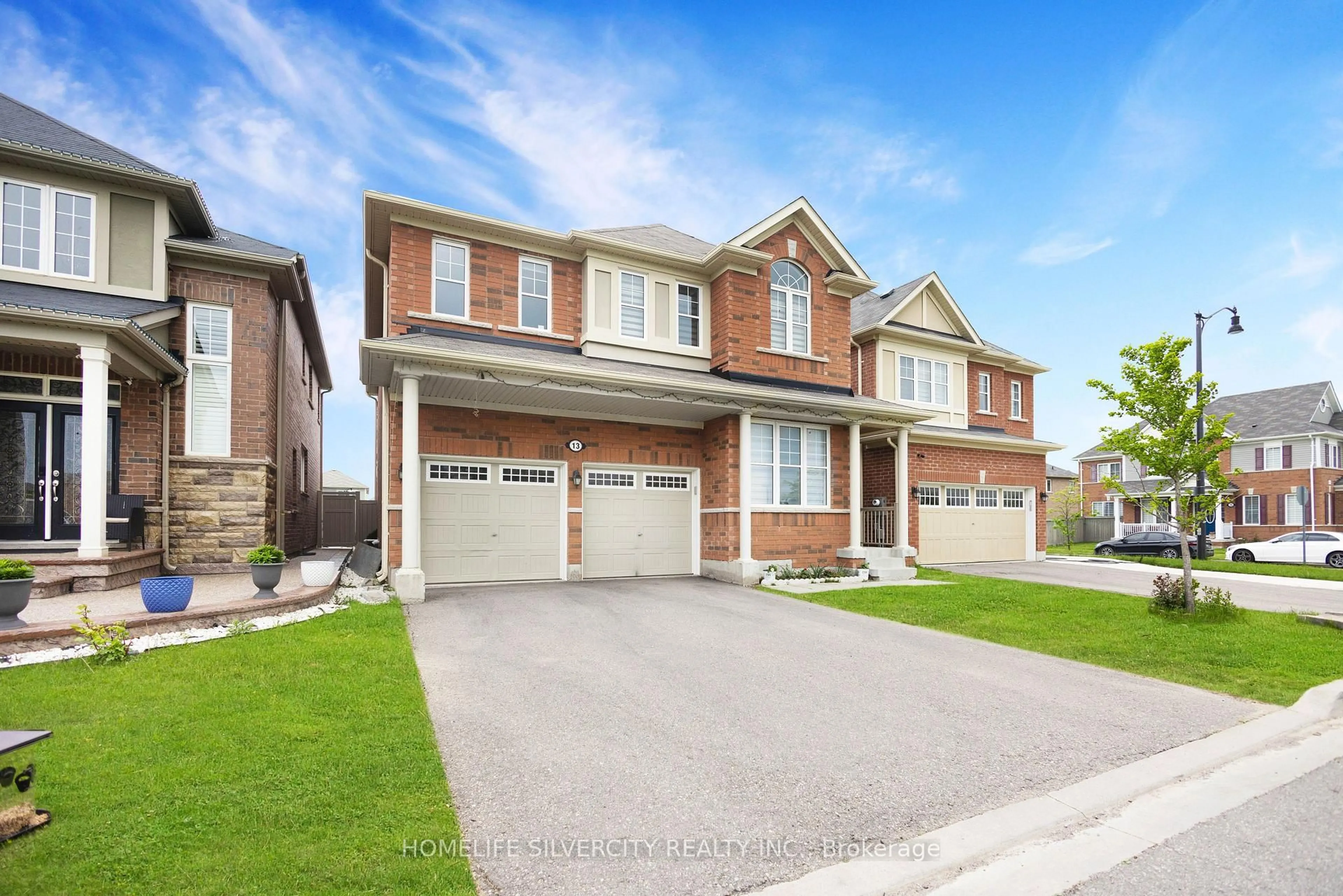 Home with brick exterior material, street for 13 Minna Tr, Brampton Ontario L7A 4T1