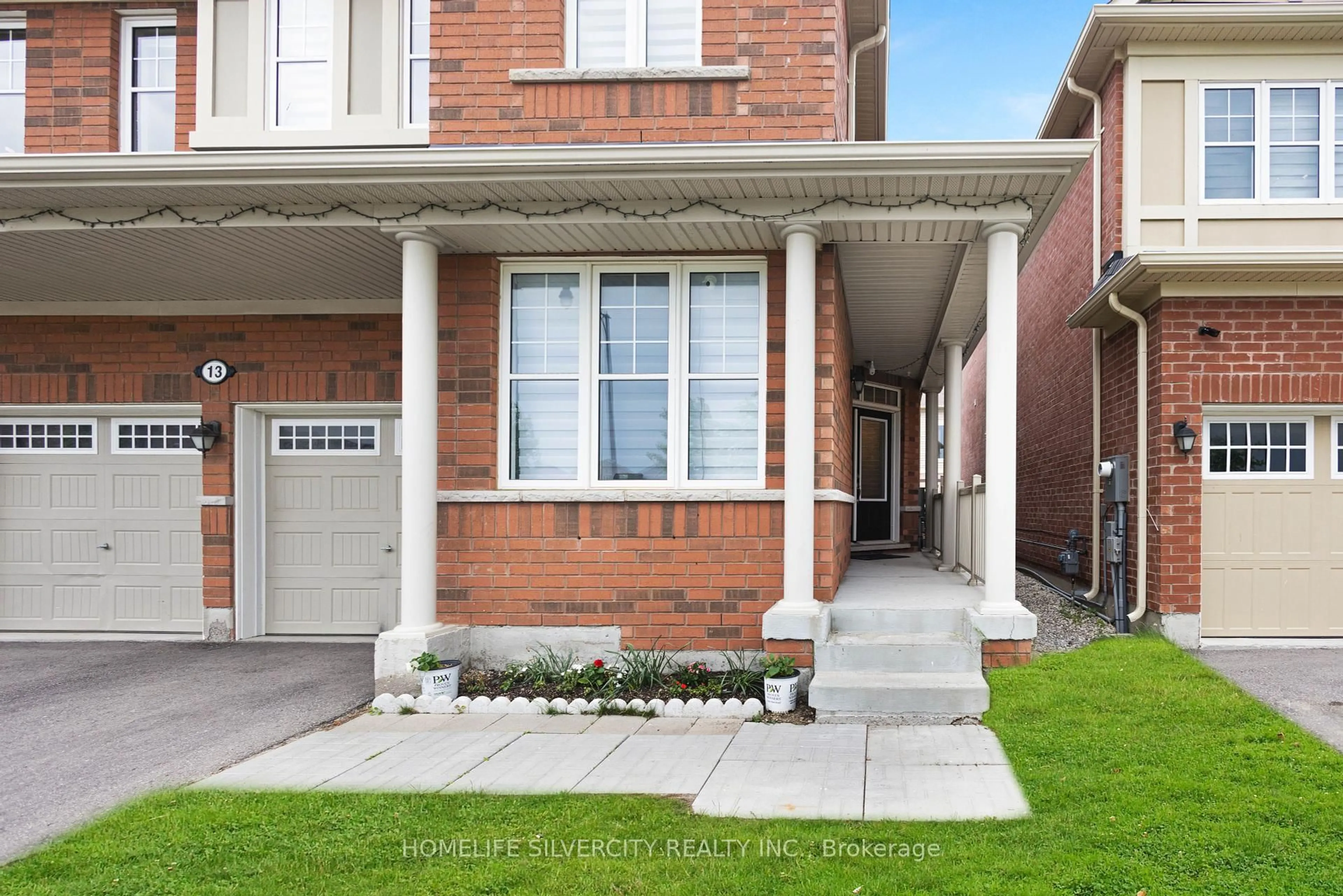 Home with brick exterior material, street for 13 Minna Tr, Brampton Ontario L7A 4T1