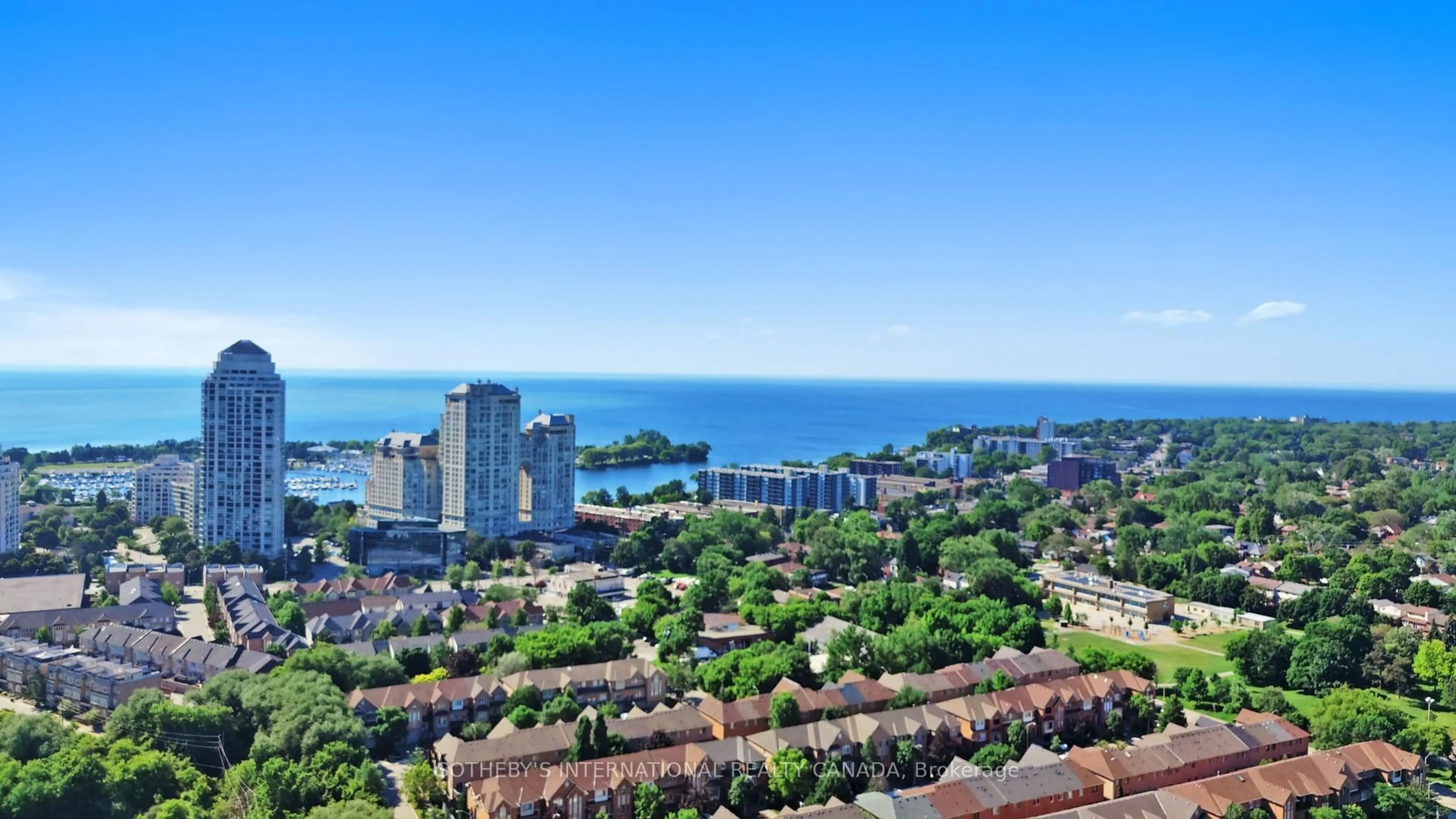 A pic from outside/outdoor area/front of a property/back of a property/a pic from drone, water/lake/river/ocean view for 251 Manitoba St #TH-113, Toronto Ontario M8Y 4G9