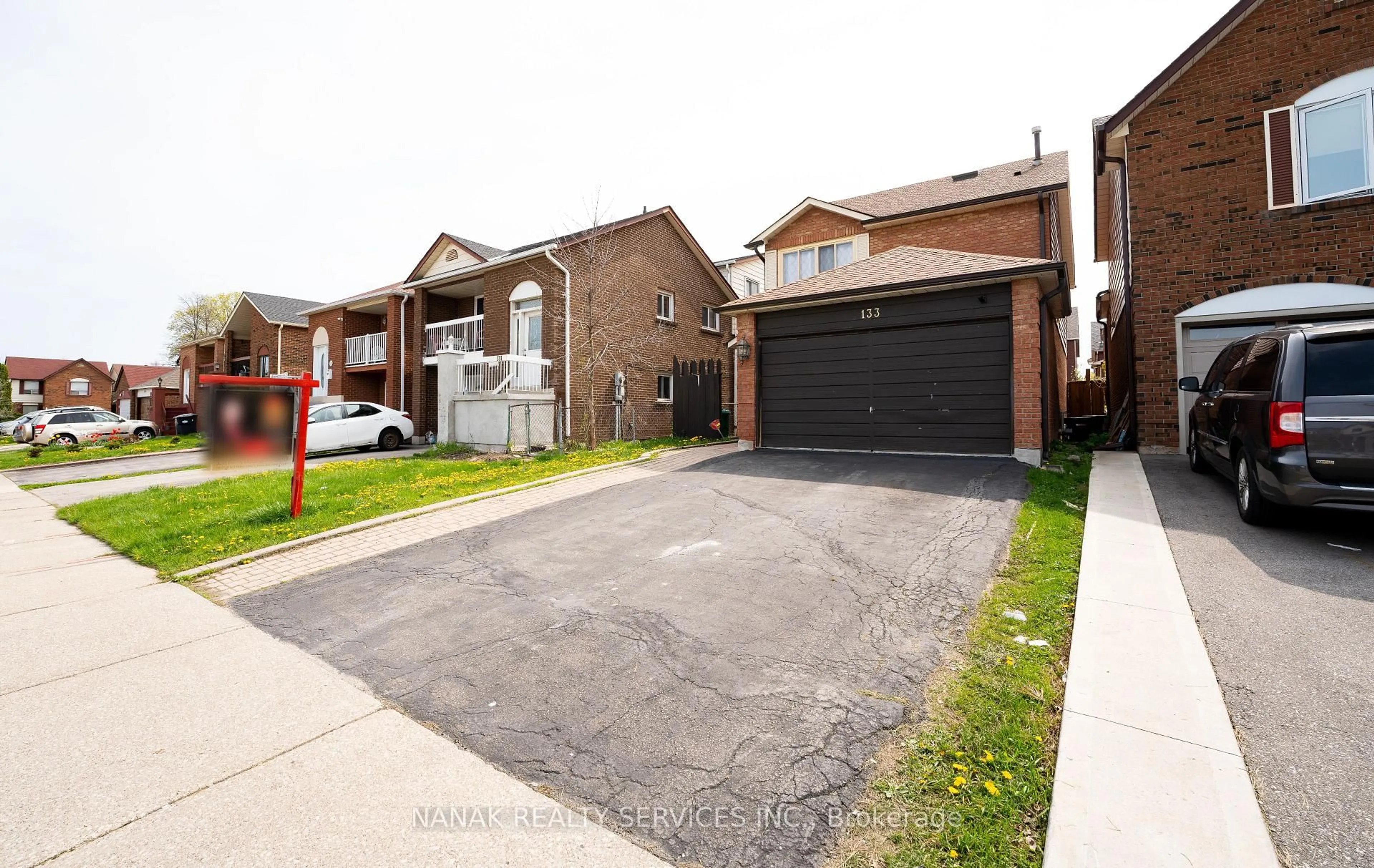 Home with brick exterior material, street for 133 Murray St St, Brampton Ontario L6X 2S5
