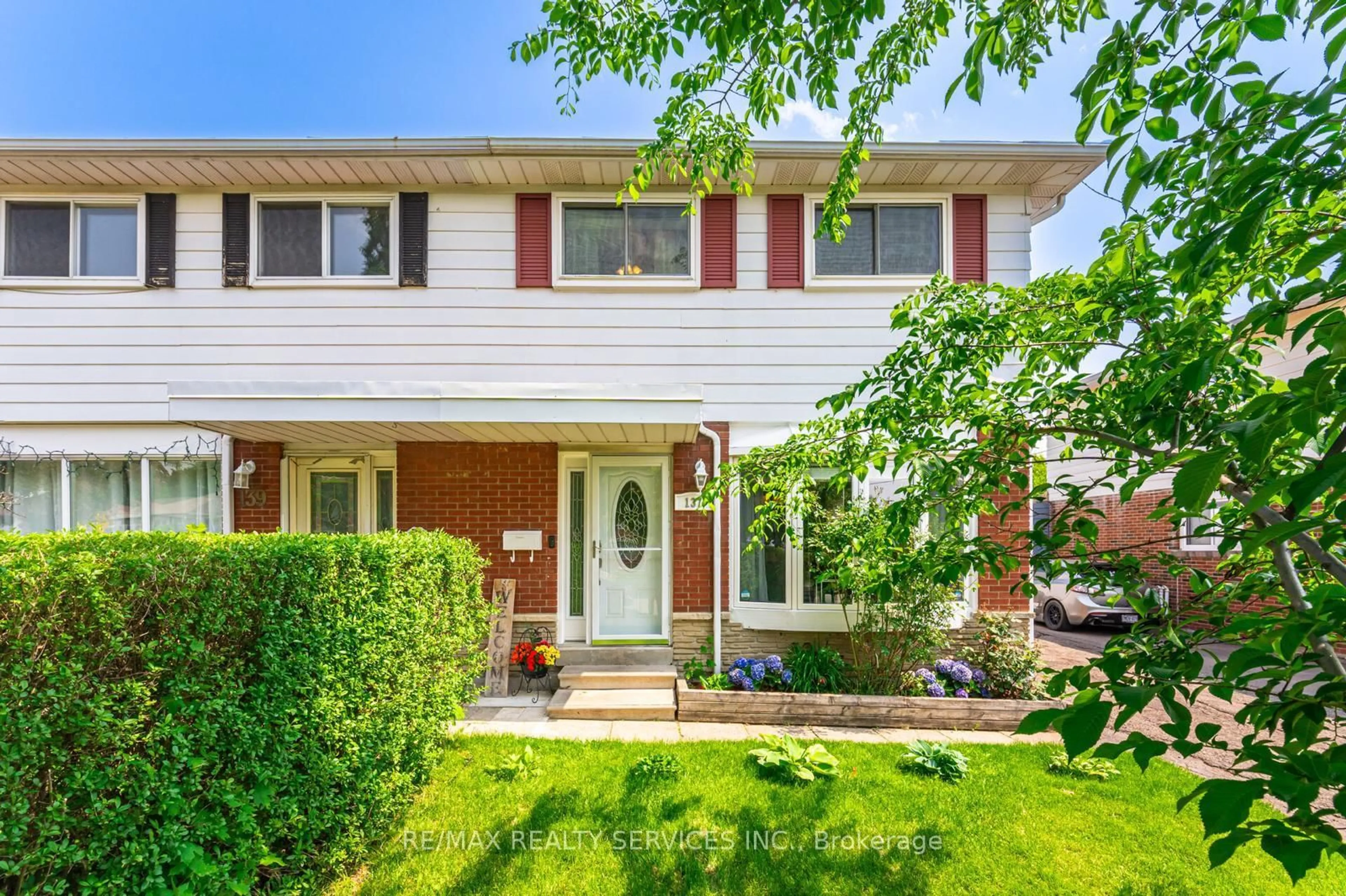 Home with vinyl exterior material, street for 137 Archdekin Dr, Brampton Ontario L6V 1Y8