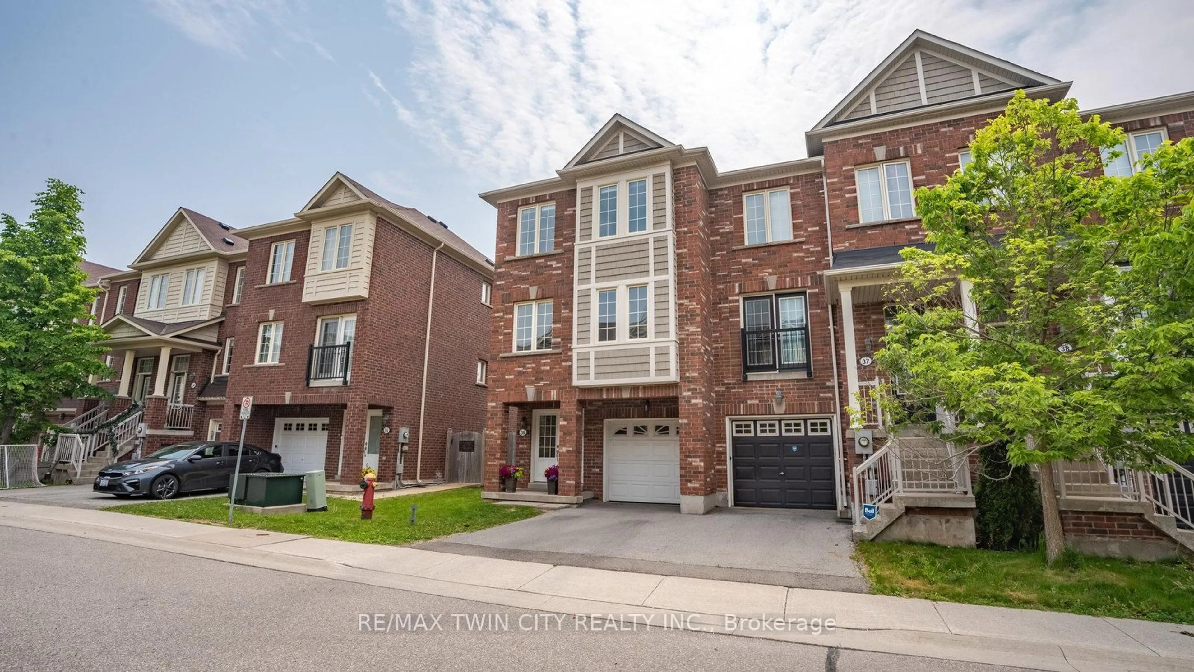 Home with brick exterior material, street for 2186 Fiddlers Way #36, Oakville Ontario L6M 0L5