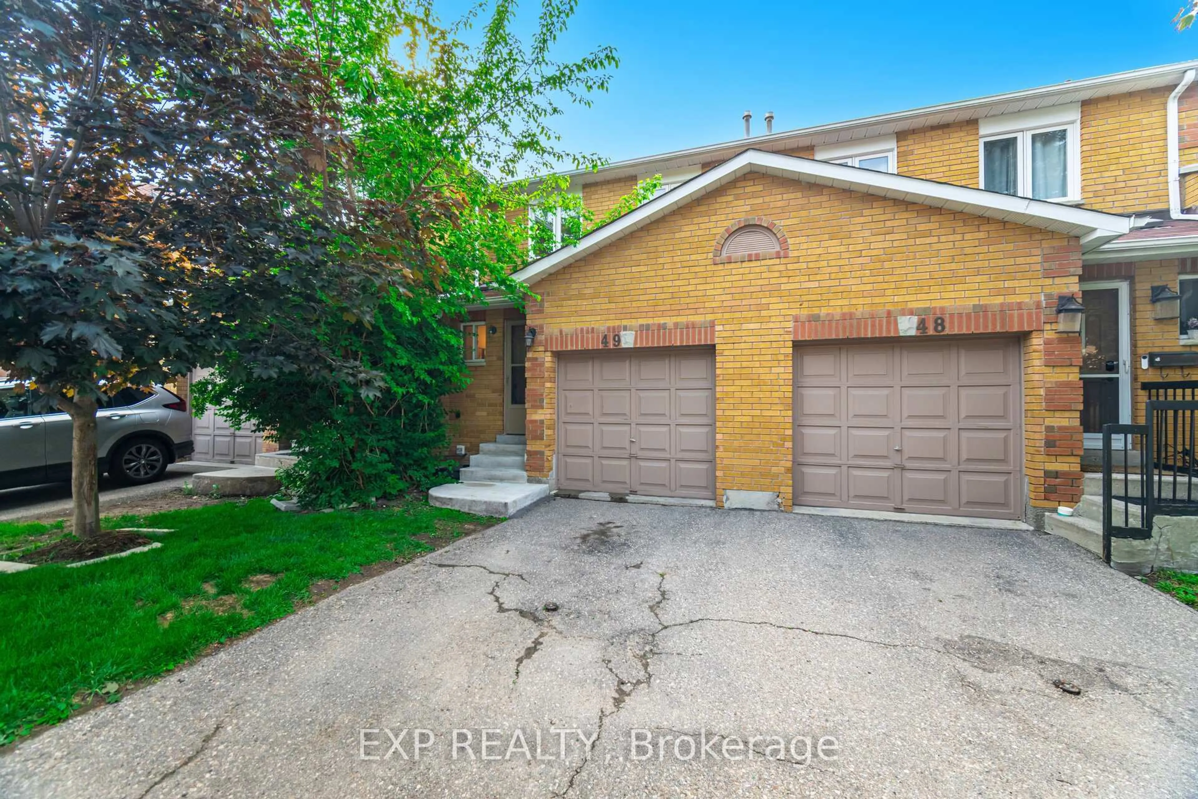 Home with brick exterior material, street for 550 Steddick Crt #49, Mississauga Ontario L5R 3S8