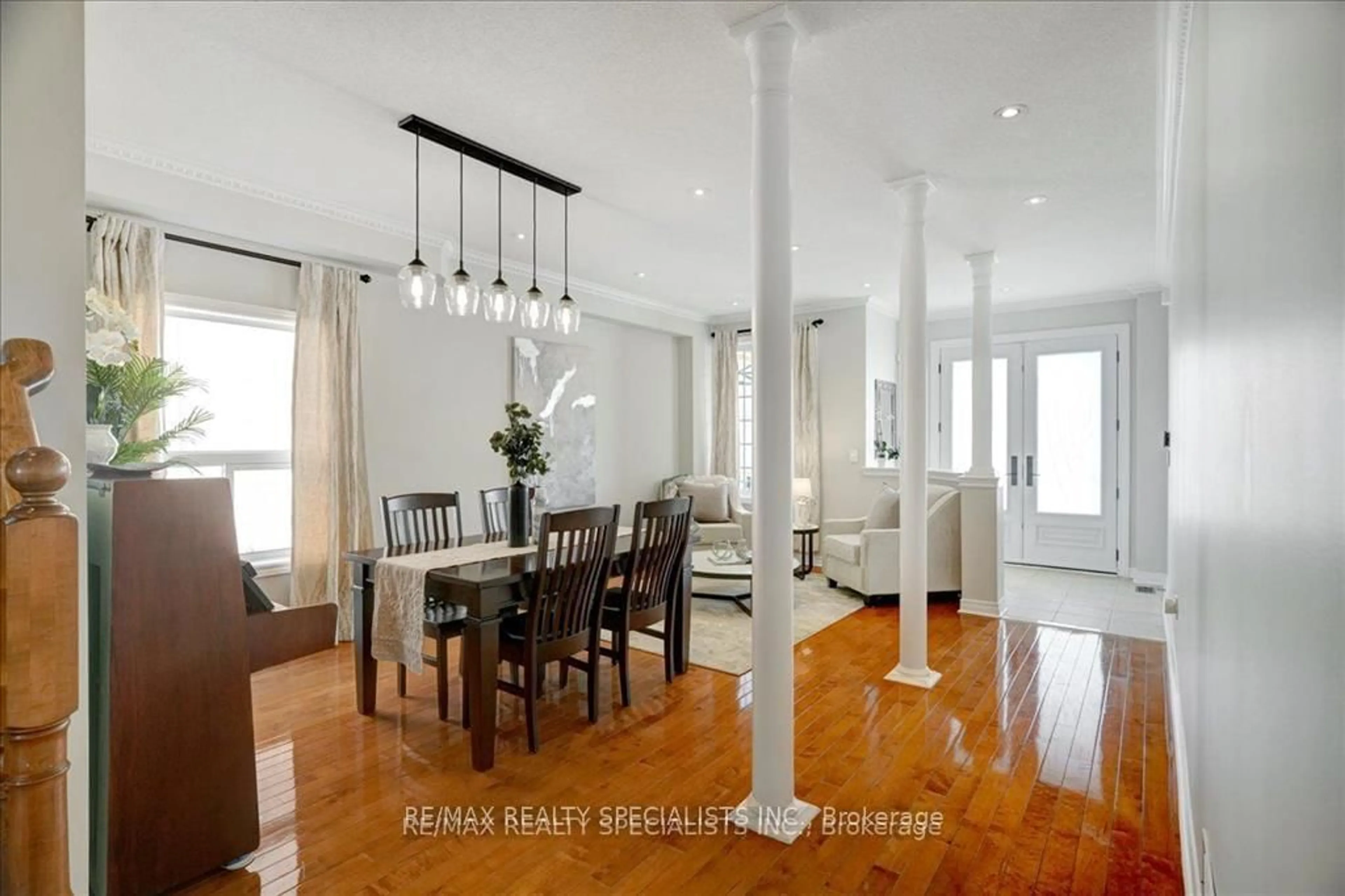 Dining room, wood/laminate floor for 104 Earlsbridge Blvd, Brampton Ontario L7A 3W7