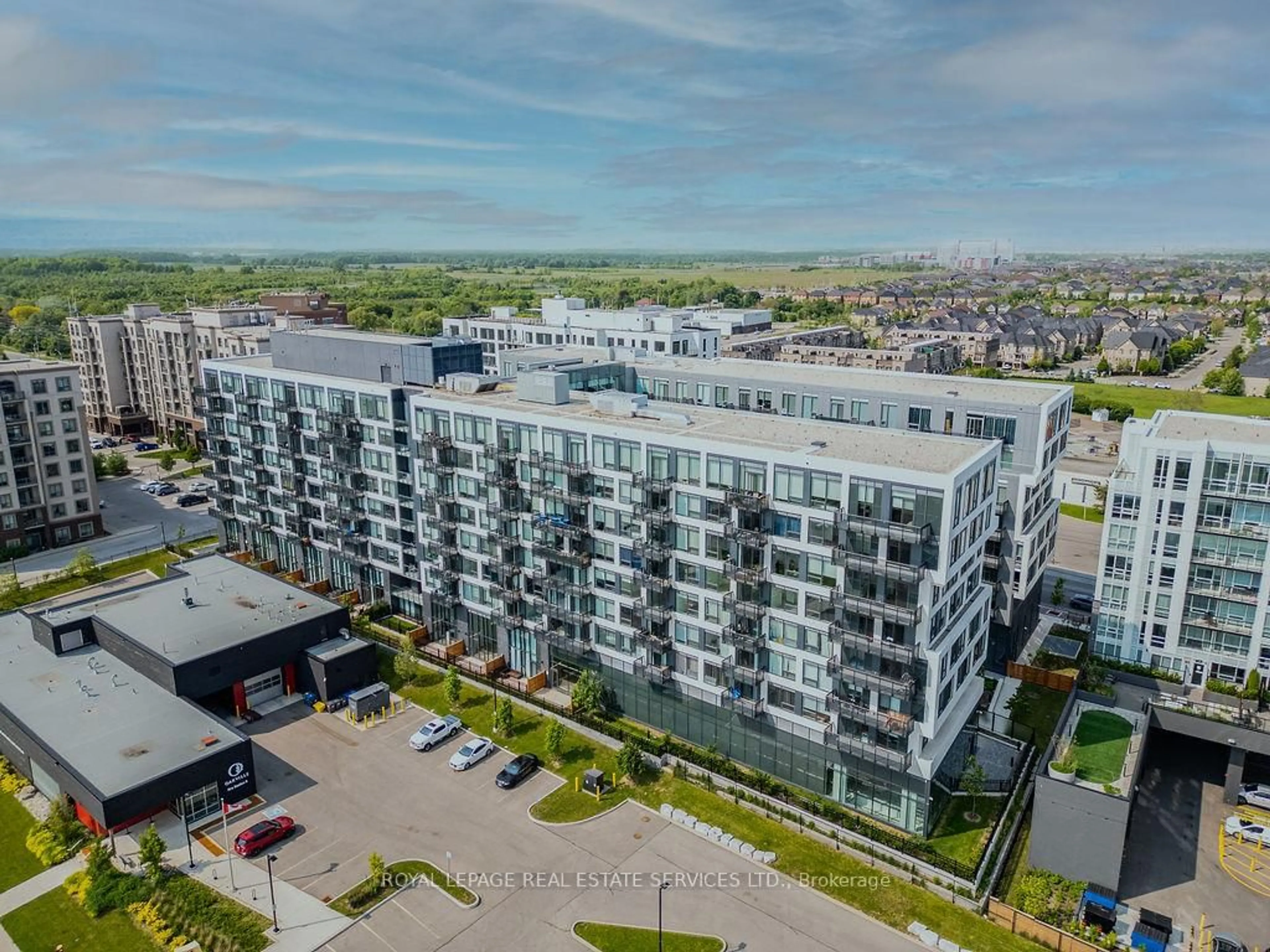 A pic from outside/outdoor area/front of a property/back of a property/a pic from drone, city buildings view from balcony for 2450 Old Bronte Rd #229, Oakville Ontario L6M 5P6