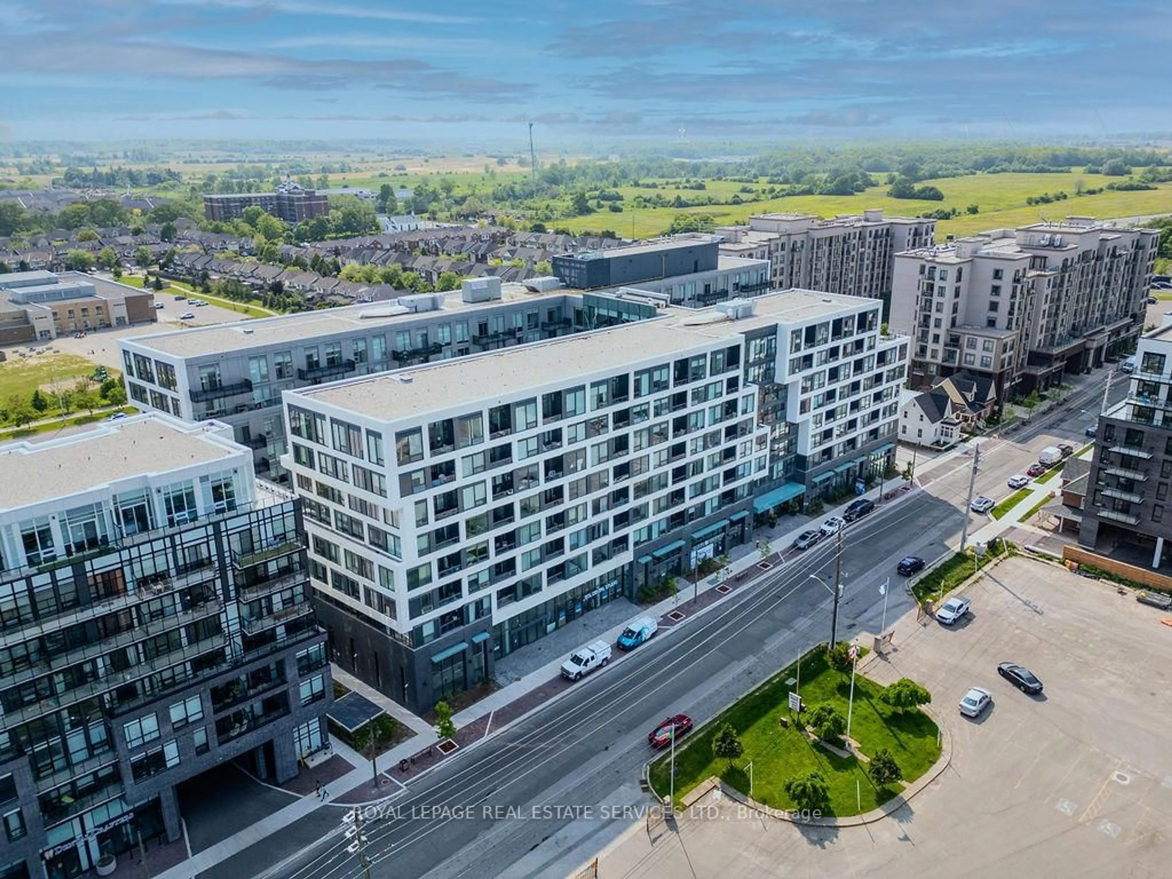 A pic from outside/outdoor area/front of a property/back of a property/a pic from drone, city buildings view from balcony for 2450 Old Bronte Rd #229, Oakville Ontario L6M 5P6