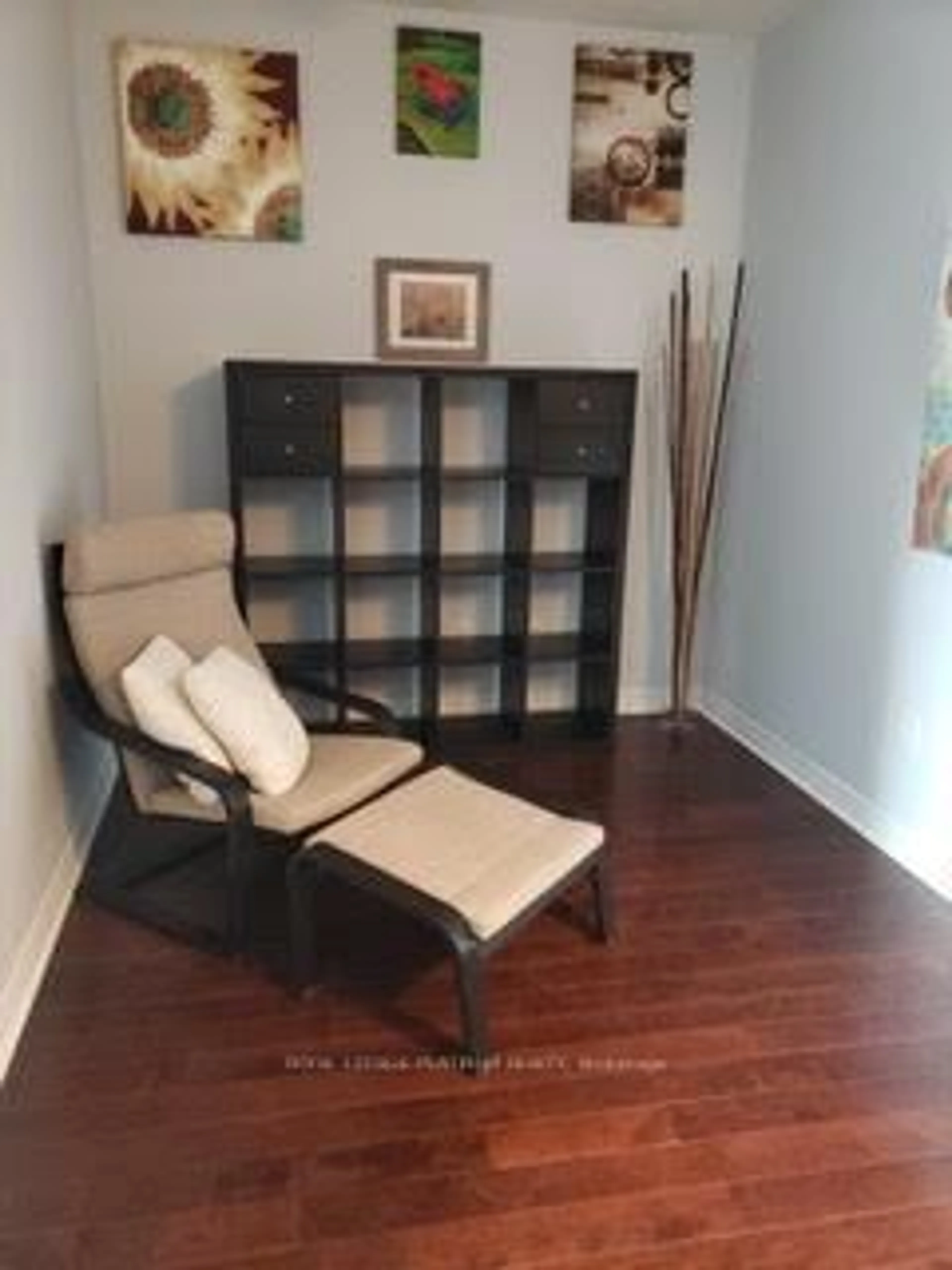 Living room with furniture, wood/laminate floor for 385 Prince of wales Dr, Mississauga Ontario L5B 0C6