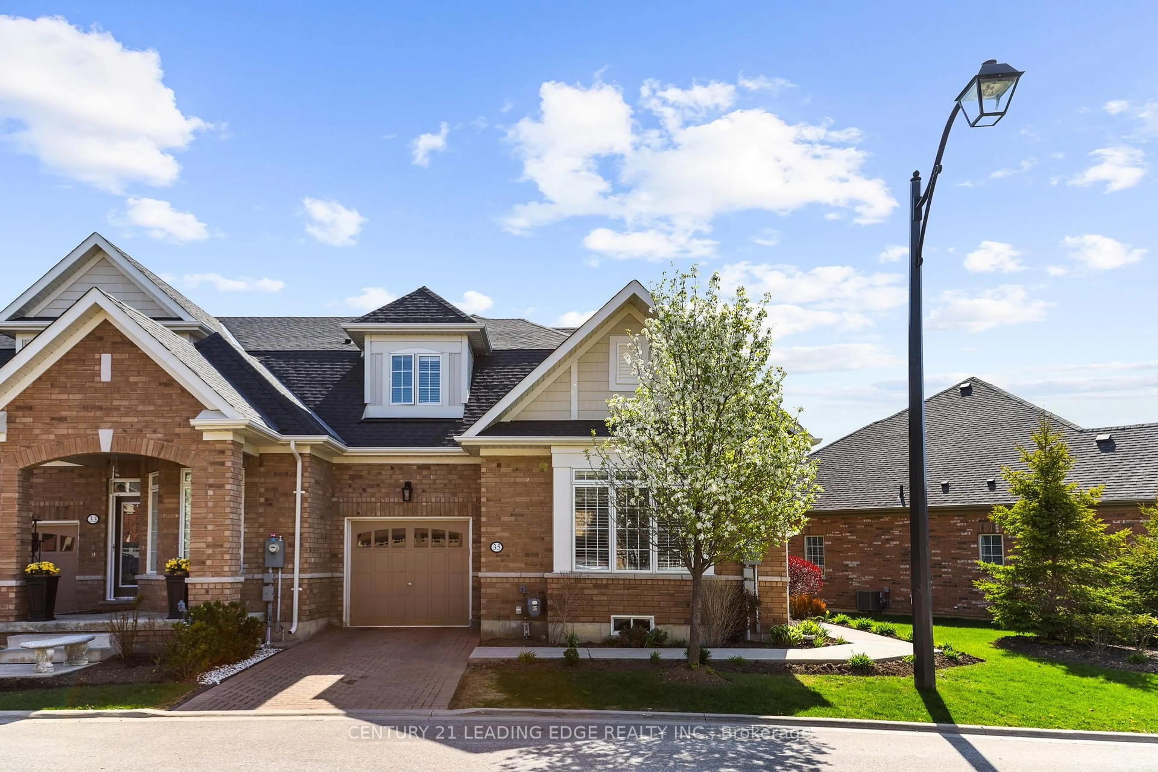 Home with brick exterior material, street for 35 Lobelia St, Brampton Ontario L6R 3Z6