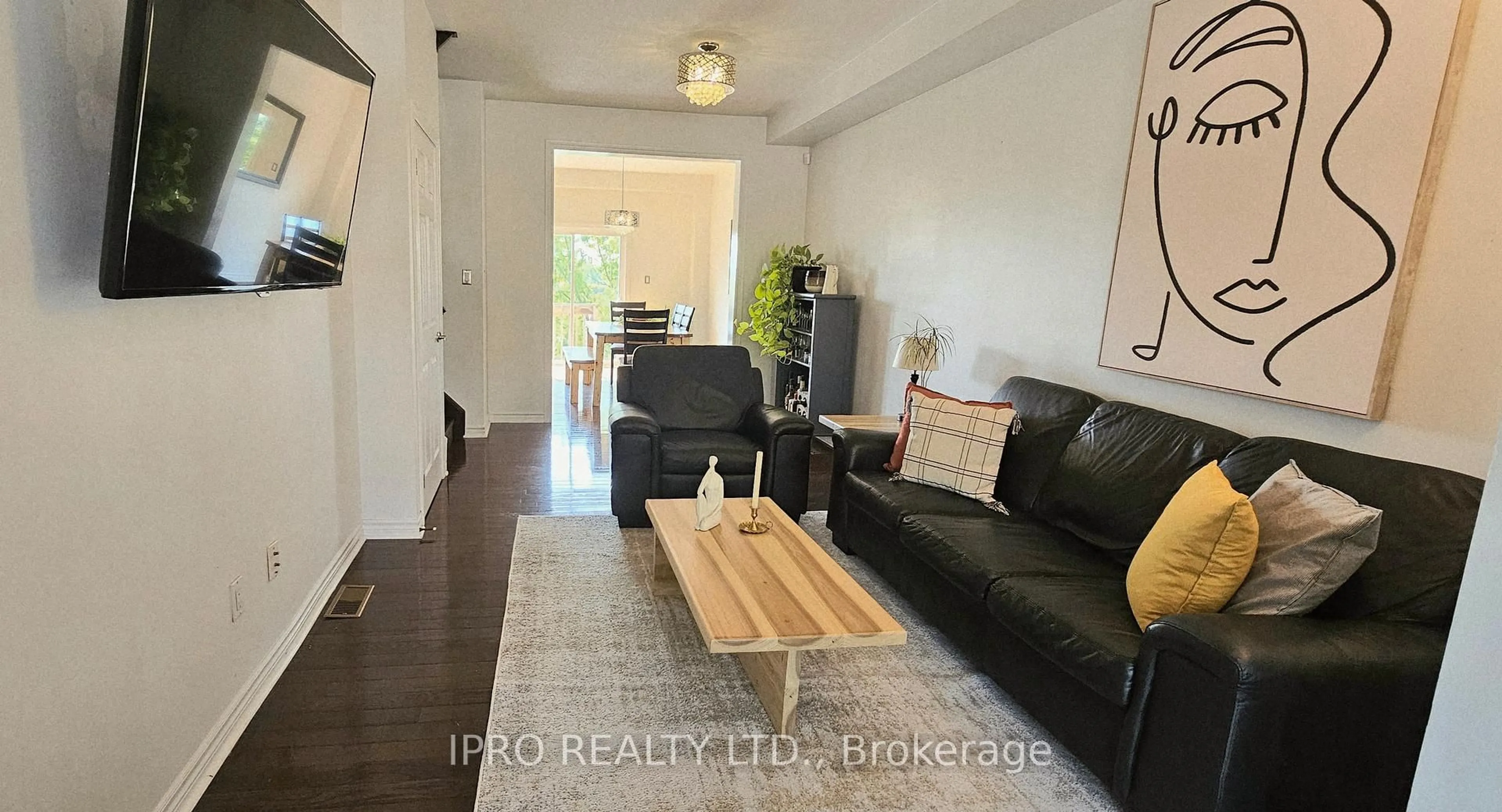 Living room with furniture, wood/laminate floor for 355 Hobbs Cres, Milton Ontario L9T 0J3