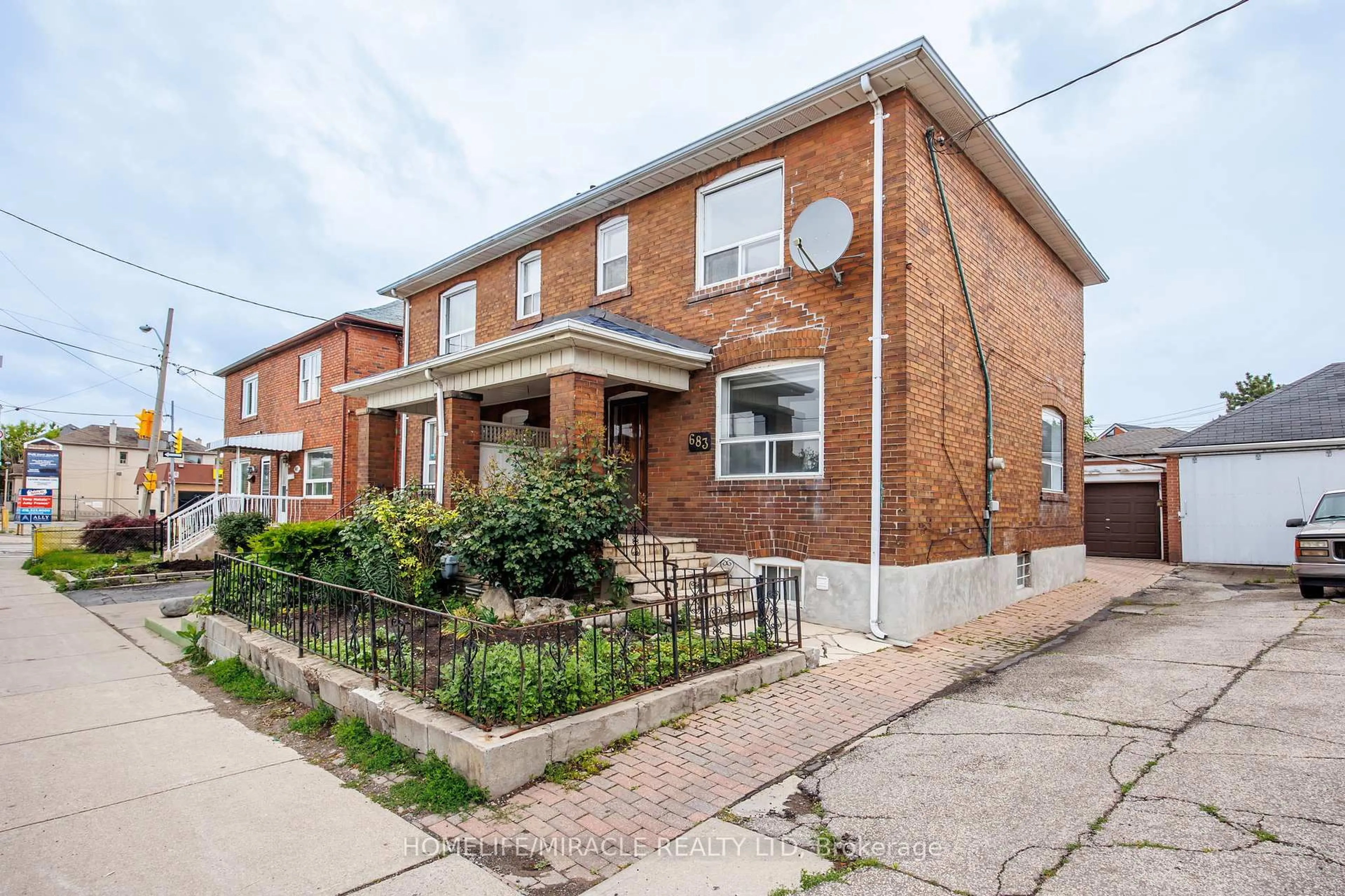 Home with brick exterior material, street for 683 Old Weston Rd, Toronto Ontario M6N 3B6