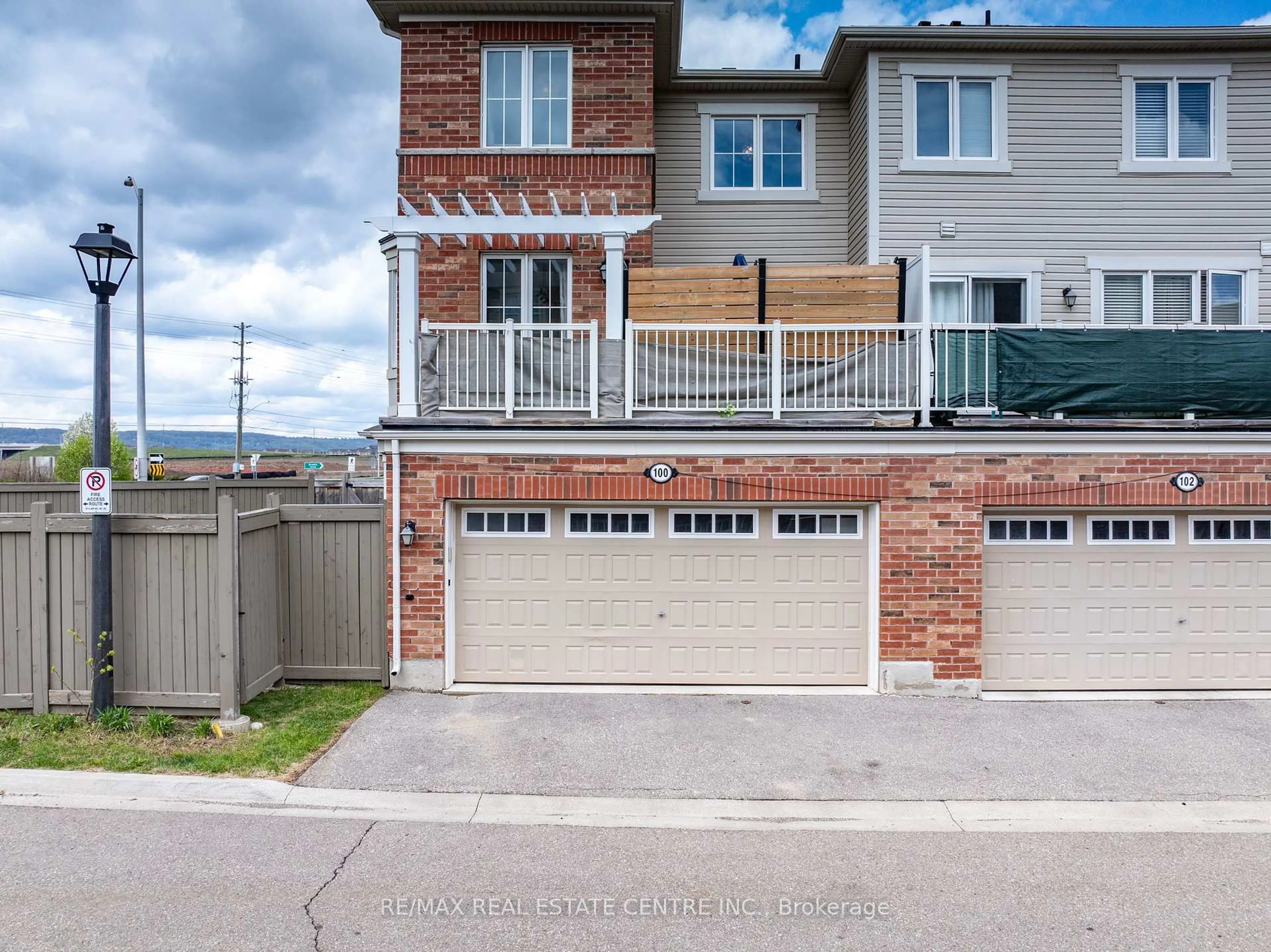A pic from outside/outdoor area/front of a property/back of a property/a pic from drone, street for 100 Whitlock Ave, Milton Ontario L9T 7K6