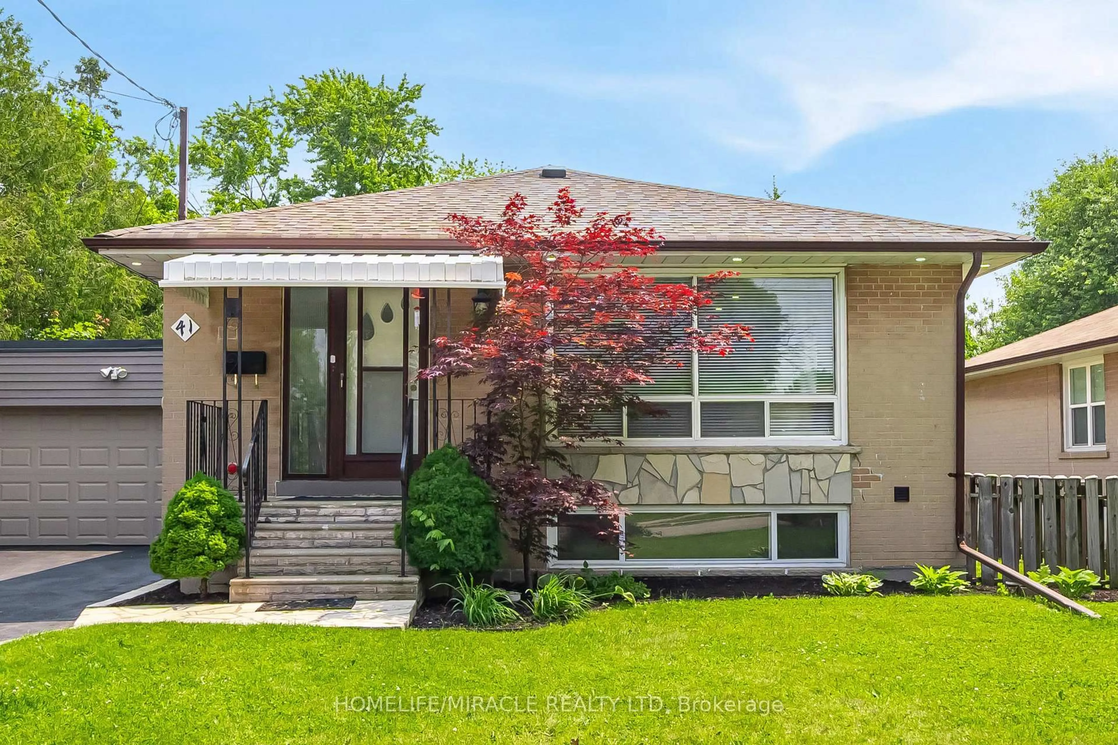 Home with vinyl exterior material, street for 41 Bradstock Rd, Toronto Ontario M9M 1M9
