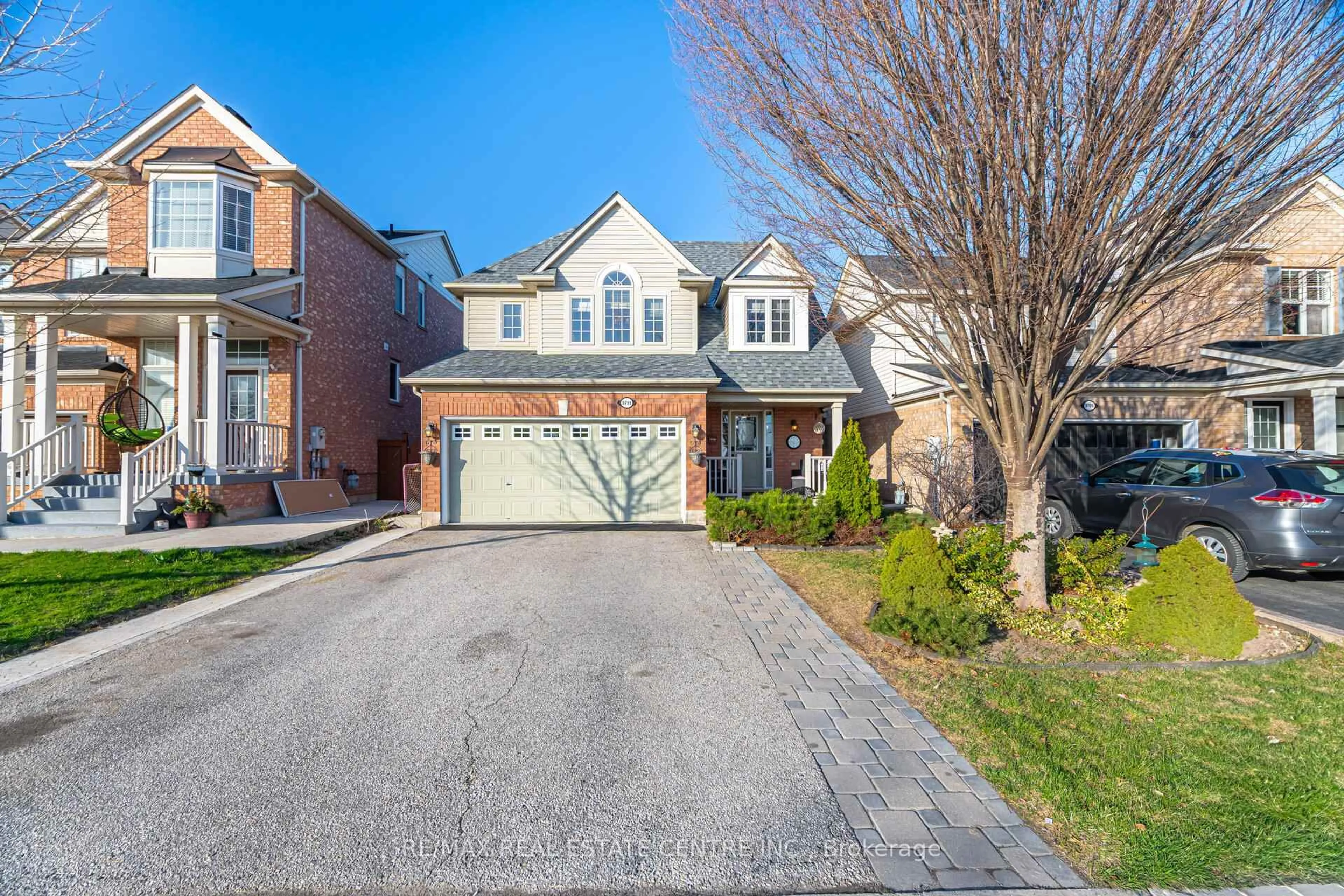 Home with brick exterior material, street for 9711 Creditview Rd, Brampton Ontario L6X 0N5