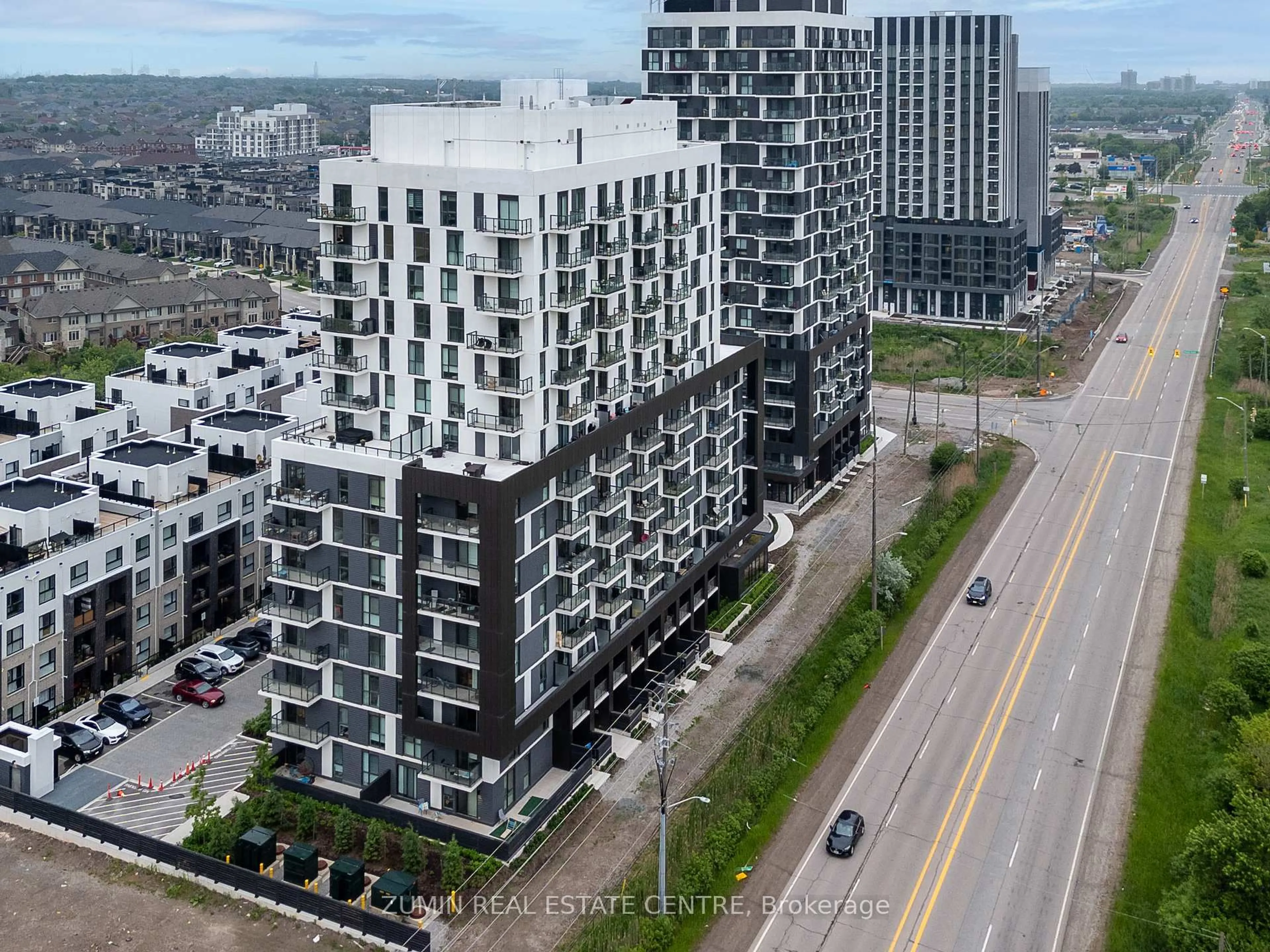 A pic from outside/outdoor area/front of a property/back of a property/a pic from drone, city buildings view from balcony for 345 Wheat Boom Dr #1408, Oakville Ontario L6H 7X4