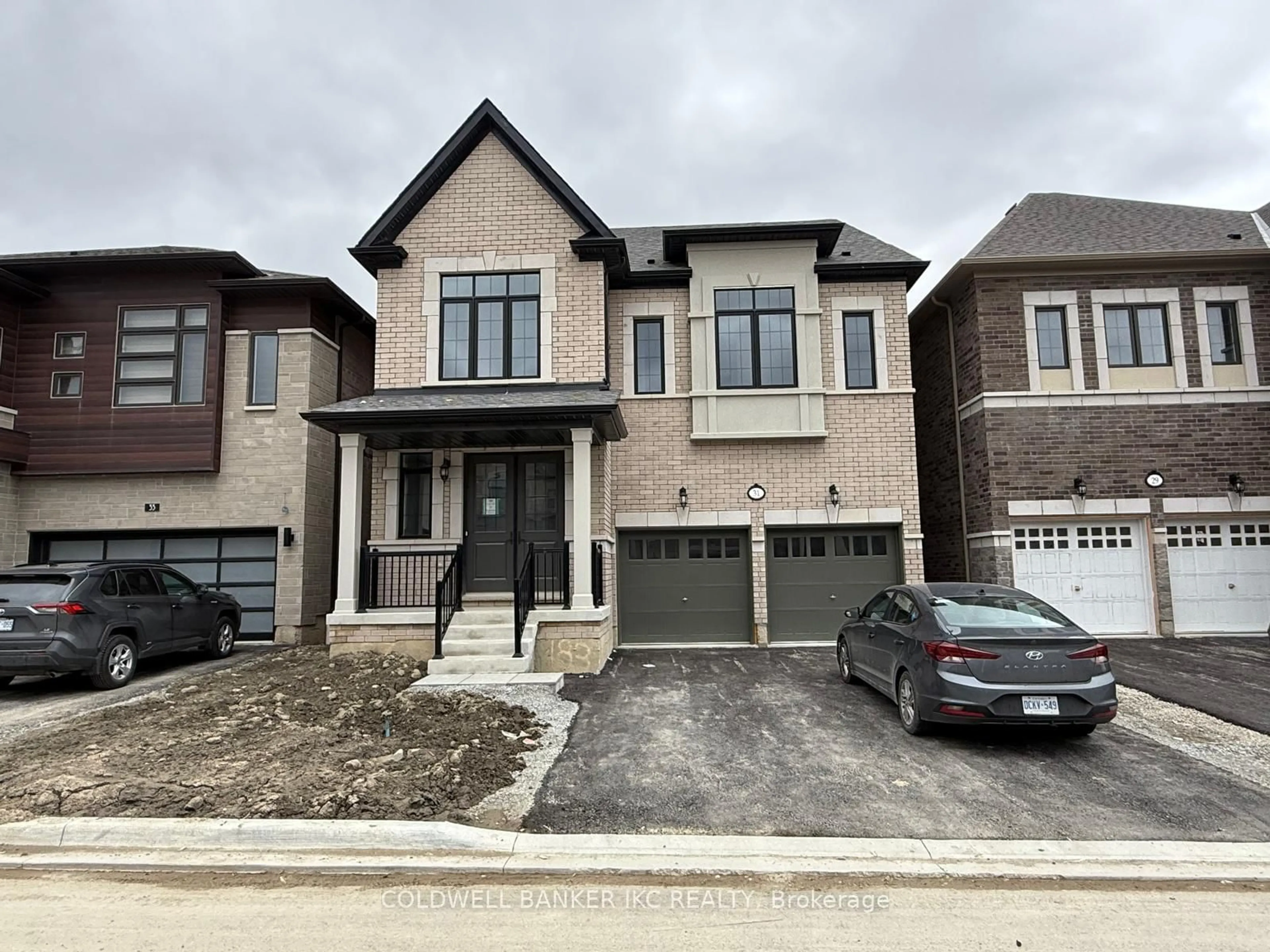 Home with brick exterior material, street for 31 Keyworth Cres, Brampton Ontario L6R 4E8