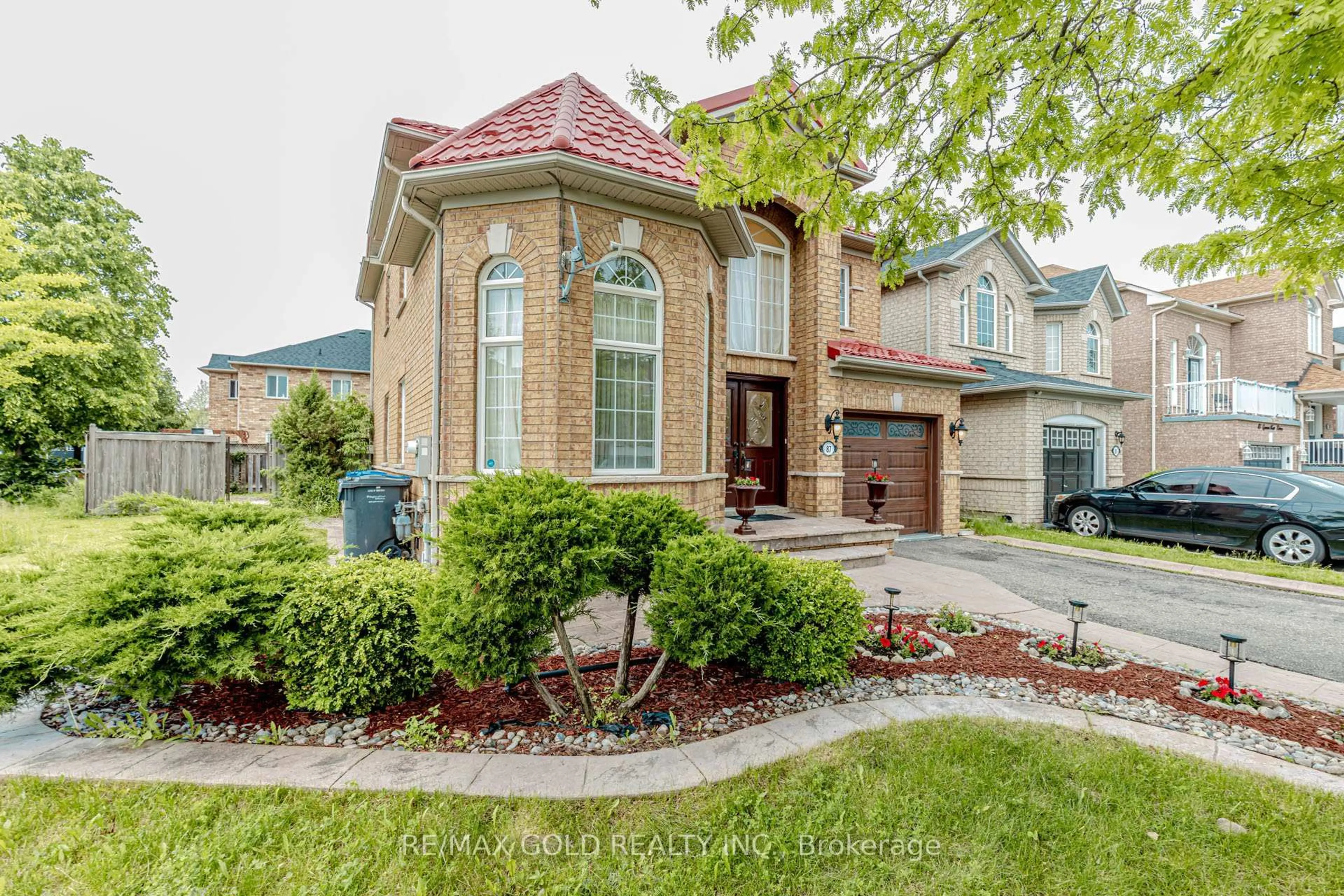 Home with brick exterior material, street for 87 Queen Mary Dr, Brampton Ontario L7A 2K2