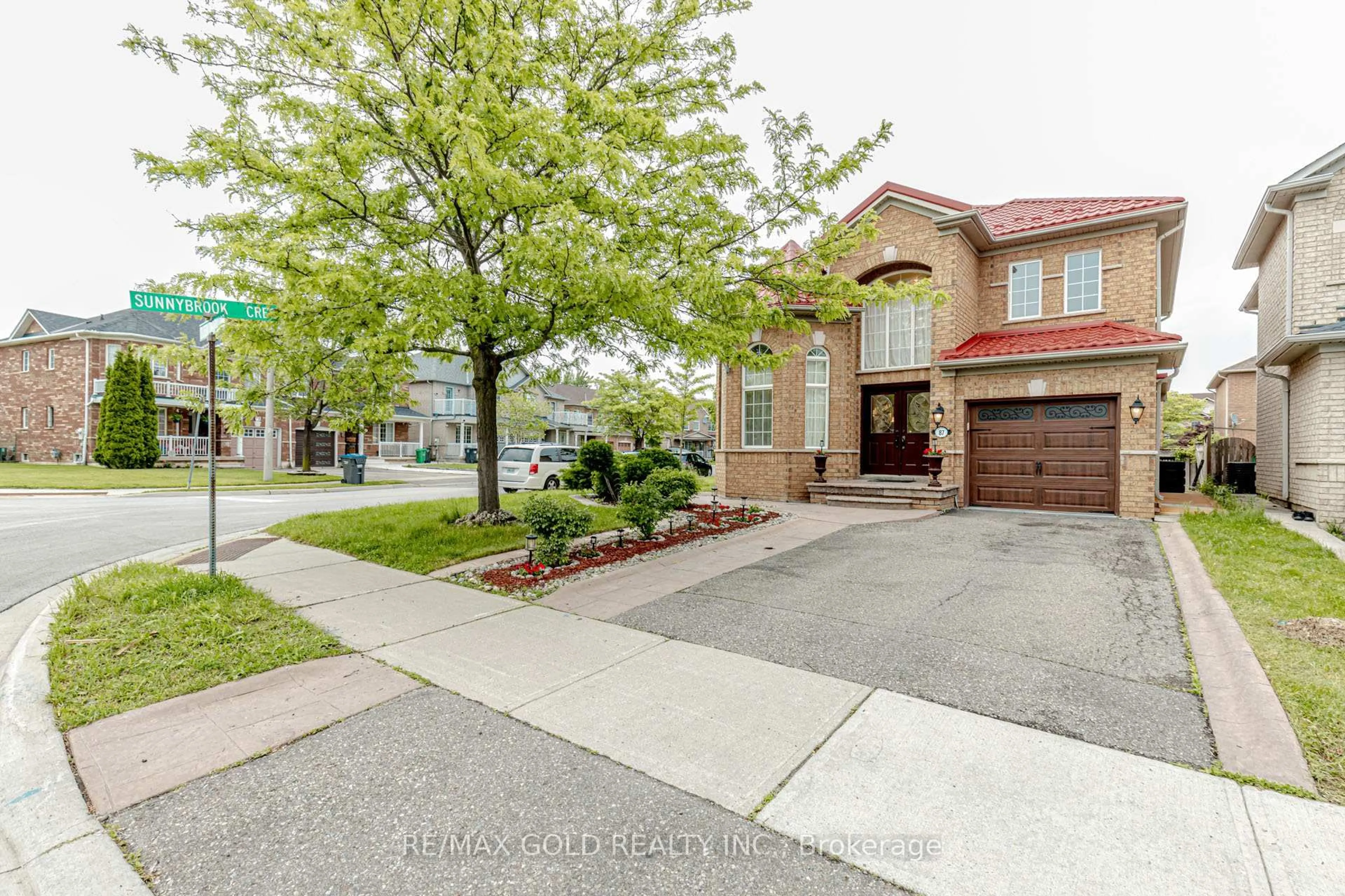 Home with brick exterior material, street for 87 Queen Mary Dr, Brampton Ontario L7A 2K2