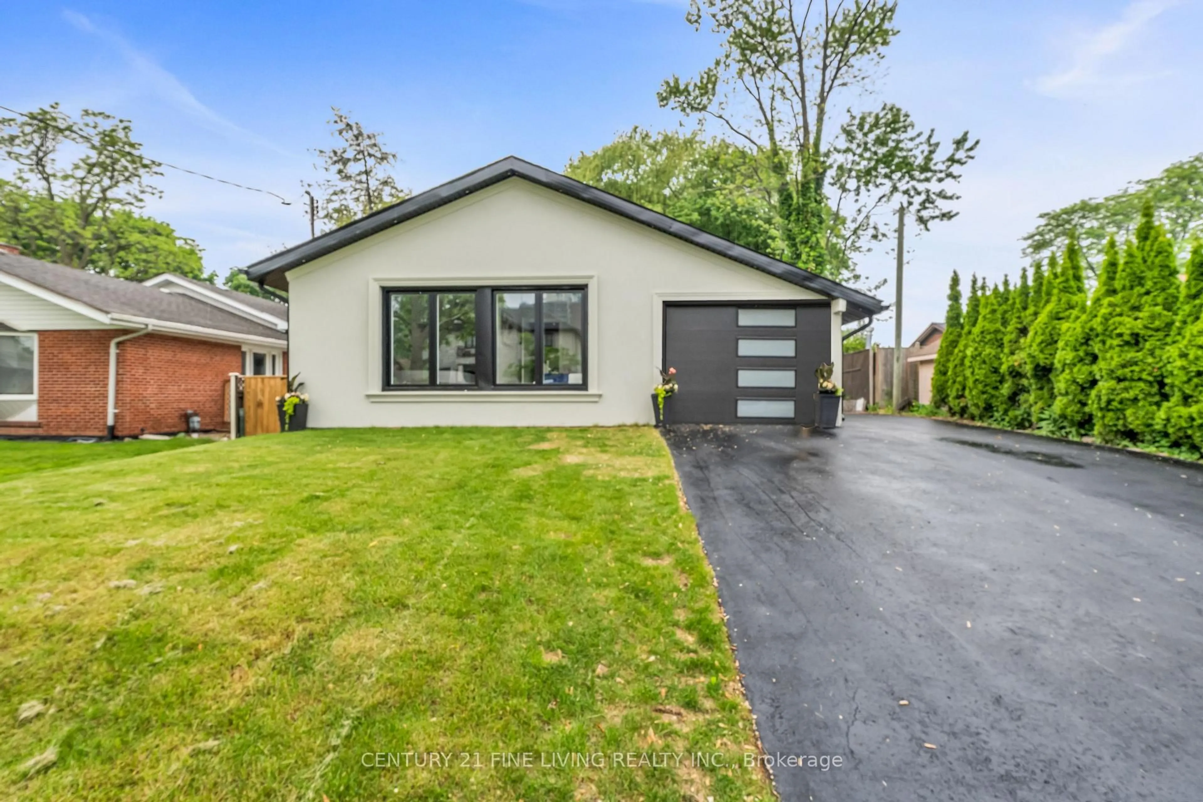 Home with vinyl exterior material, street for 46 Rossburn Dr, Toronto Ontario M9C 2P8