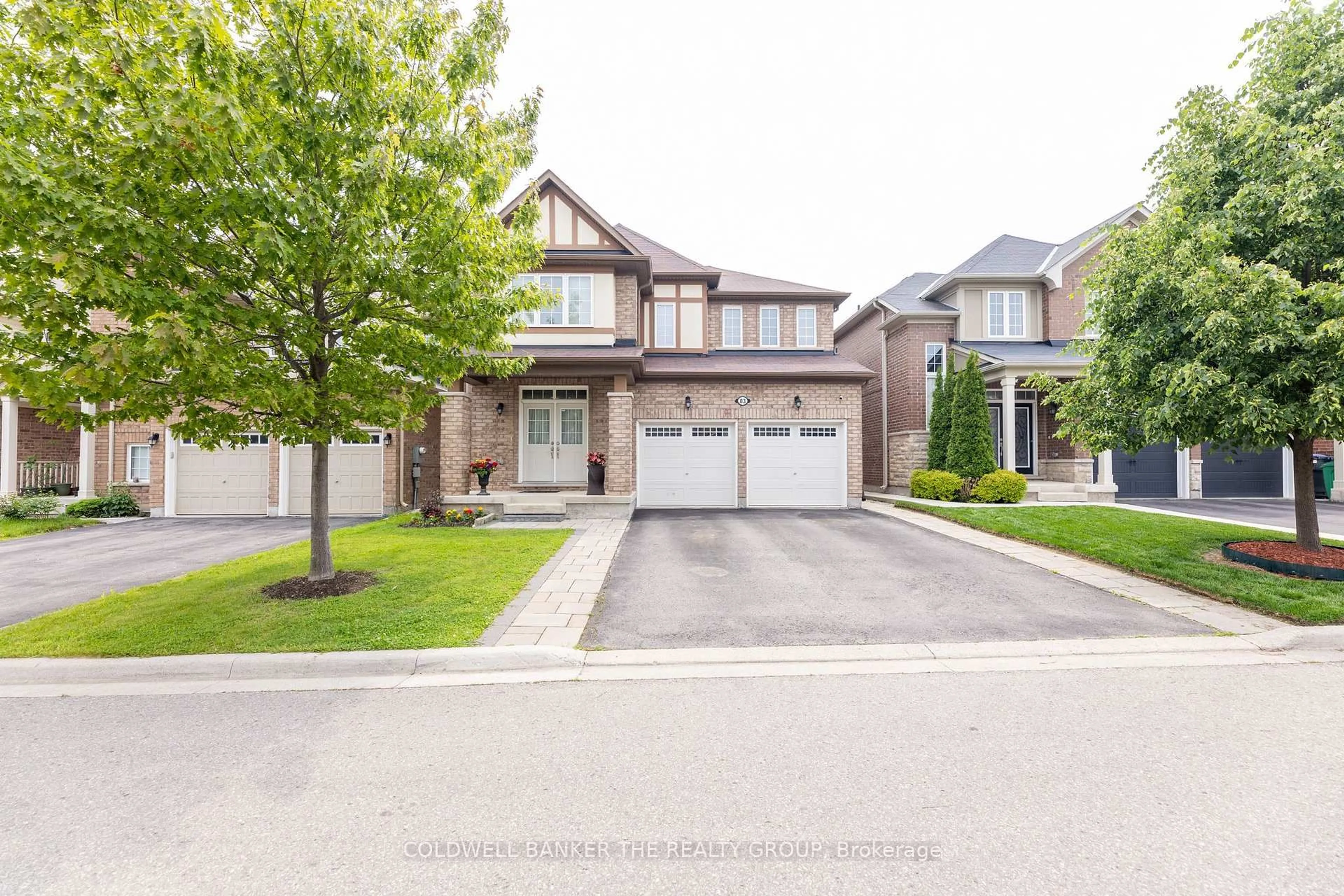 Home with brick exterior material, street for 83 Enford Cres, Brampton Ontario L7A 4C8