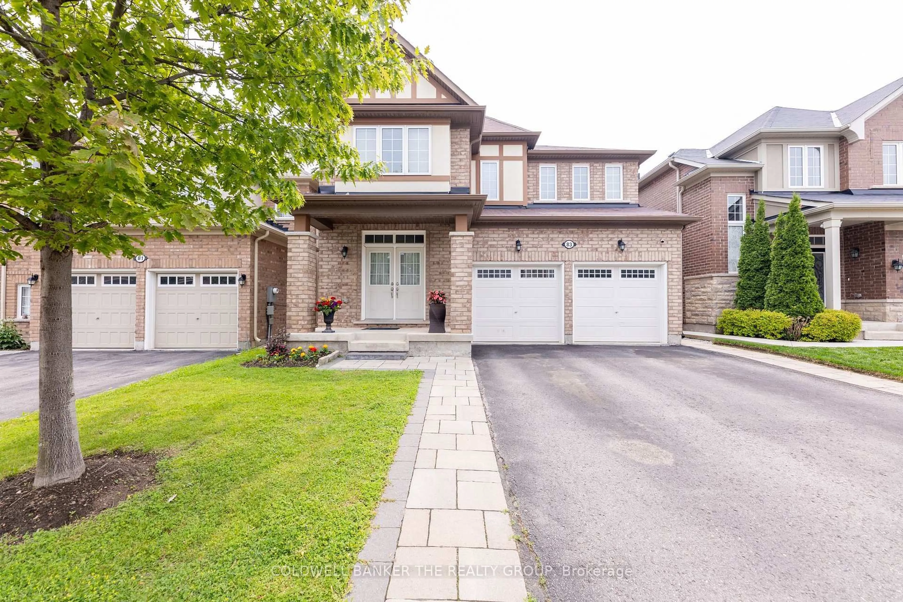 Home with brick exterior material, street for 83 Enford Cres, Brampton Ontario L7A 4C8