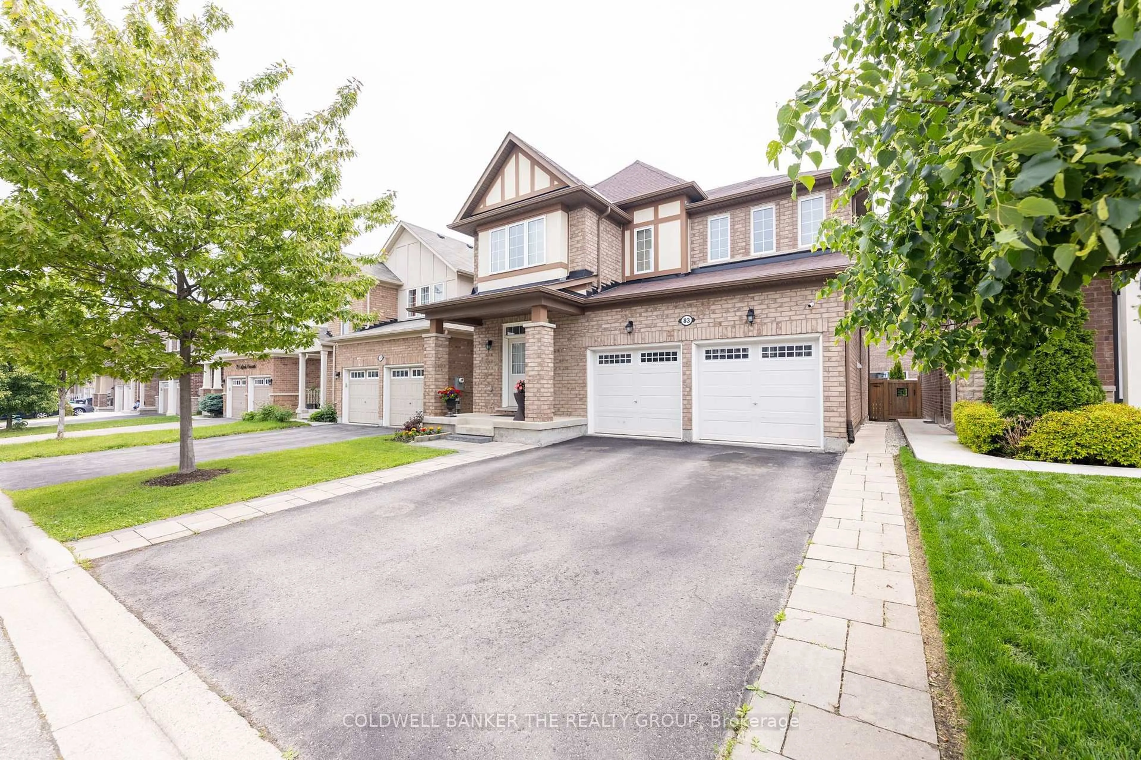 Home with brick exterior material, street for 83 Enford Cres, Brampton Ontario L7A 4C8