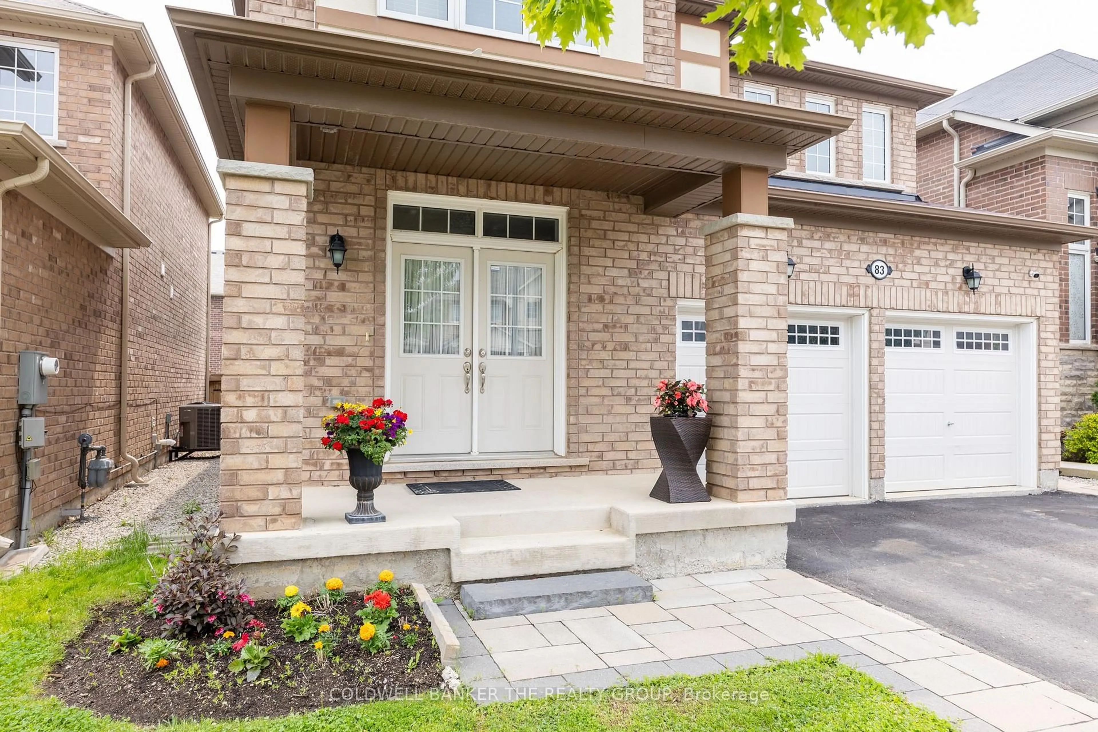 Home with brick exterior material, street for 83 Enford Cres, Brampton Ontario L7A 4C8