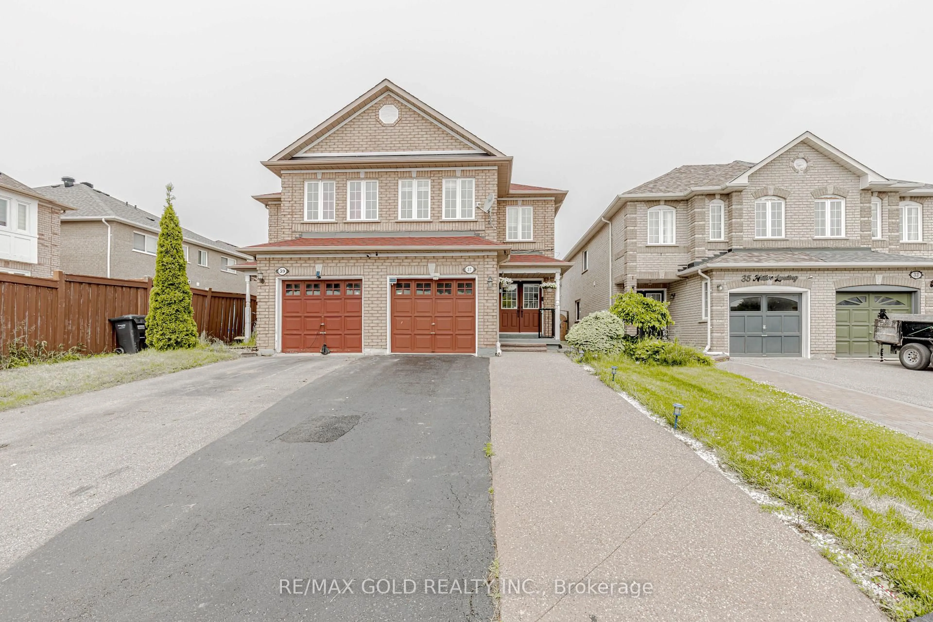 Home with brick exterior material, street for 37 Native Landing, Brampton Ontario L6X 5B1